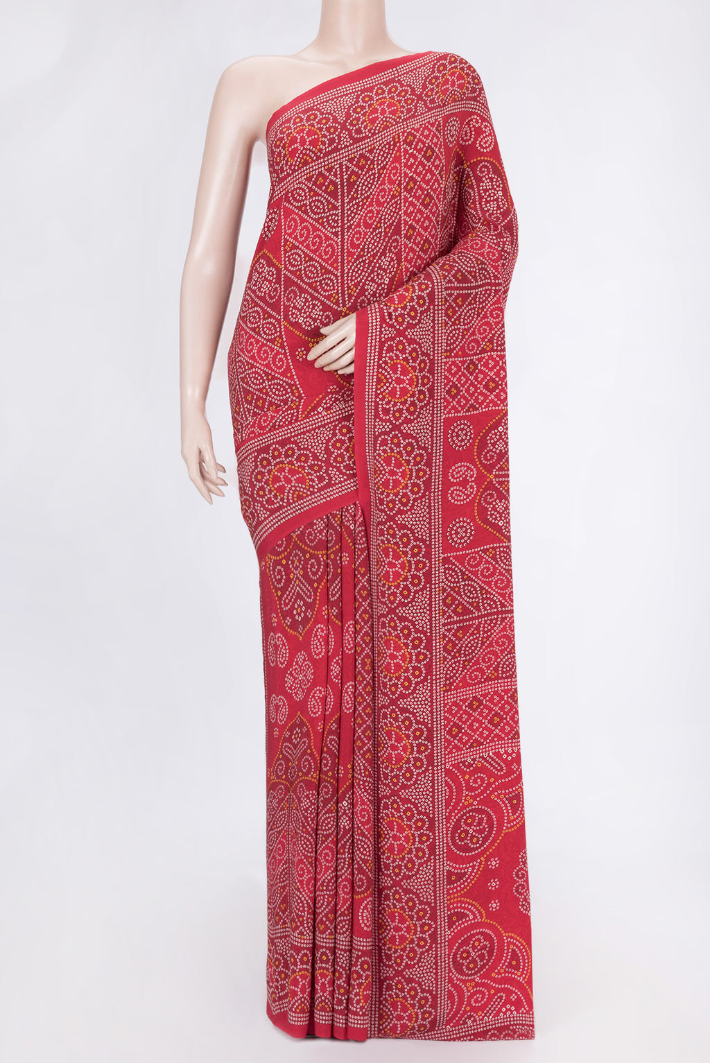 Red Dual Tone Mysore Crepe Saree with Printed design on the body and Printed Border.  displayed on a mannequin