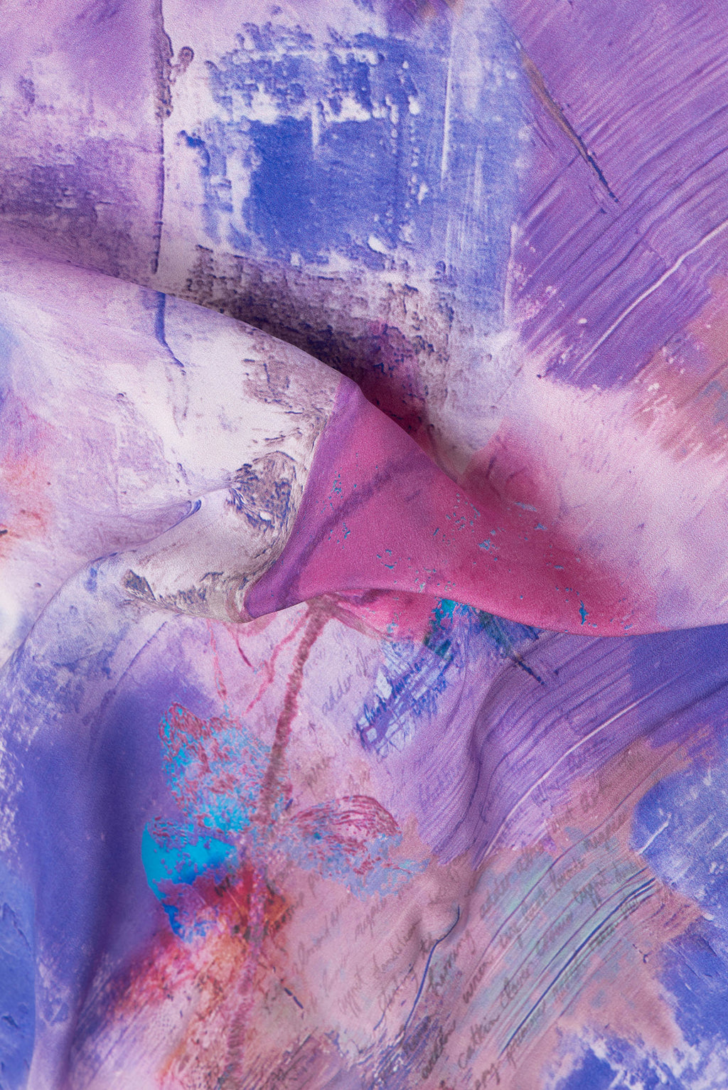 Close up of Lavender Dual Tone Mysore Crepe Saree with Printed design on the body and Plain Border.  displaying folds