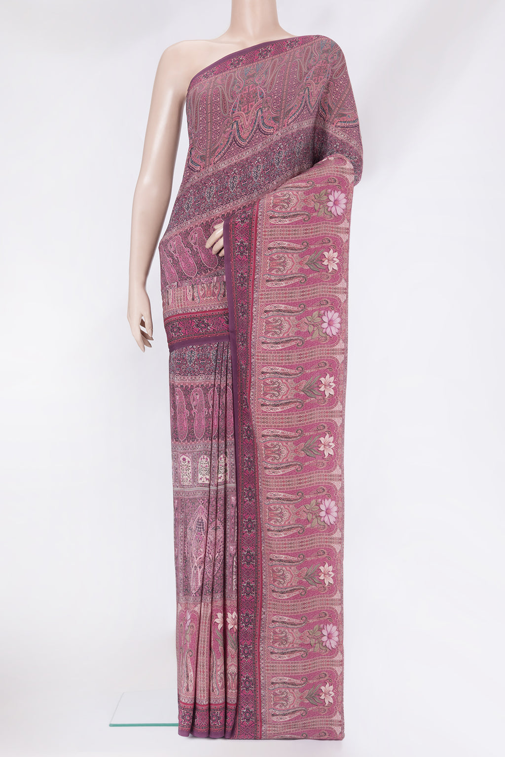 Purple Crepe Saree with Printed design on the body and Printed Border.  displayed on a mannequin