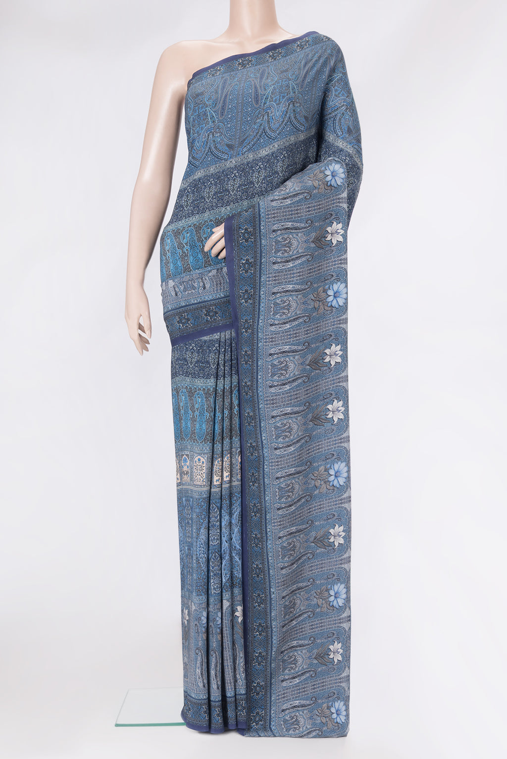 Grey Dual Tone Crepe Saree with Printed design on the body and Printed Border.  displayed on a mannequin