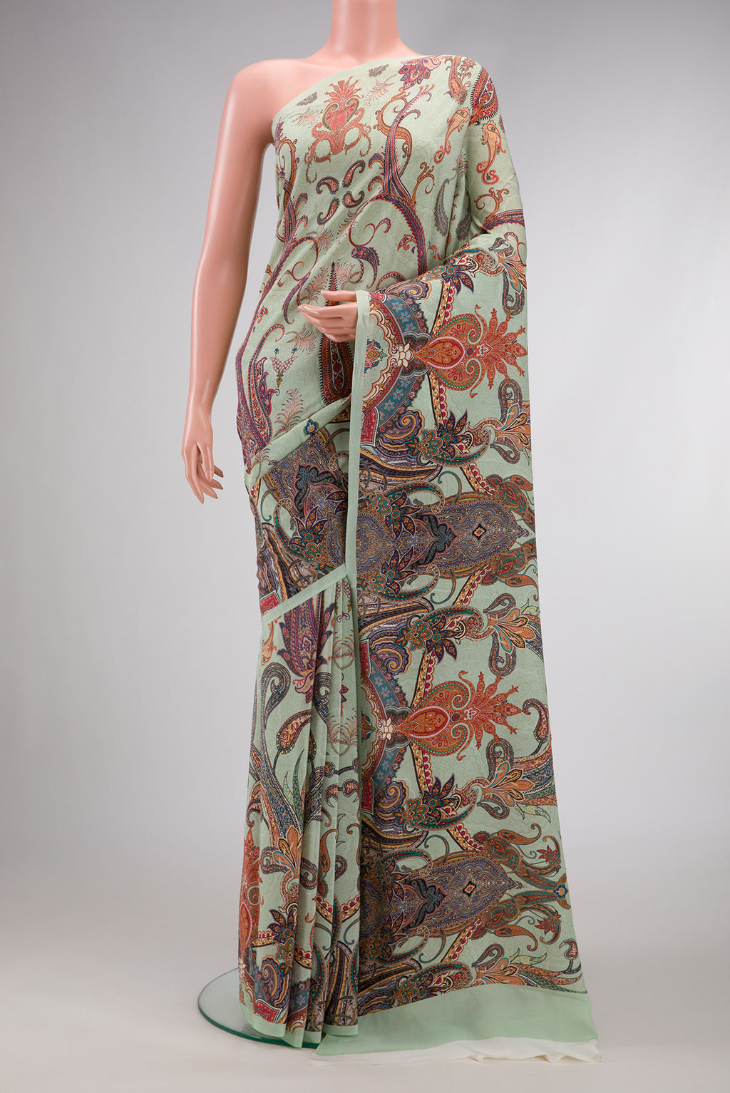 Light Green Dual Tone Mysore Crepe Saree with Printed design on the body and Without Border.  displayed on a mannequin