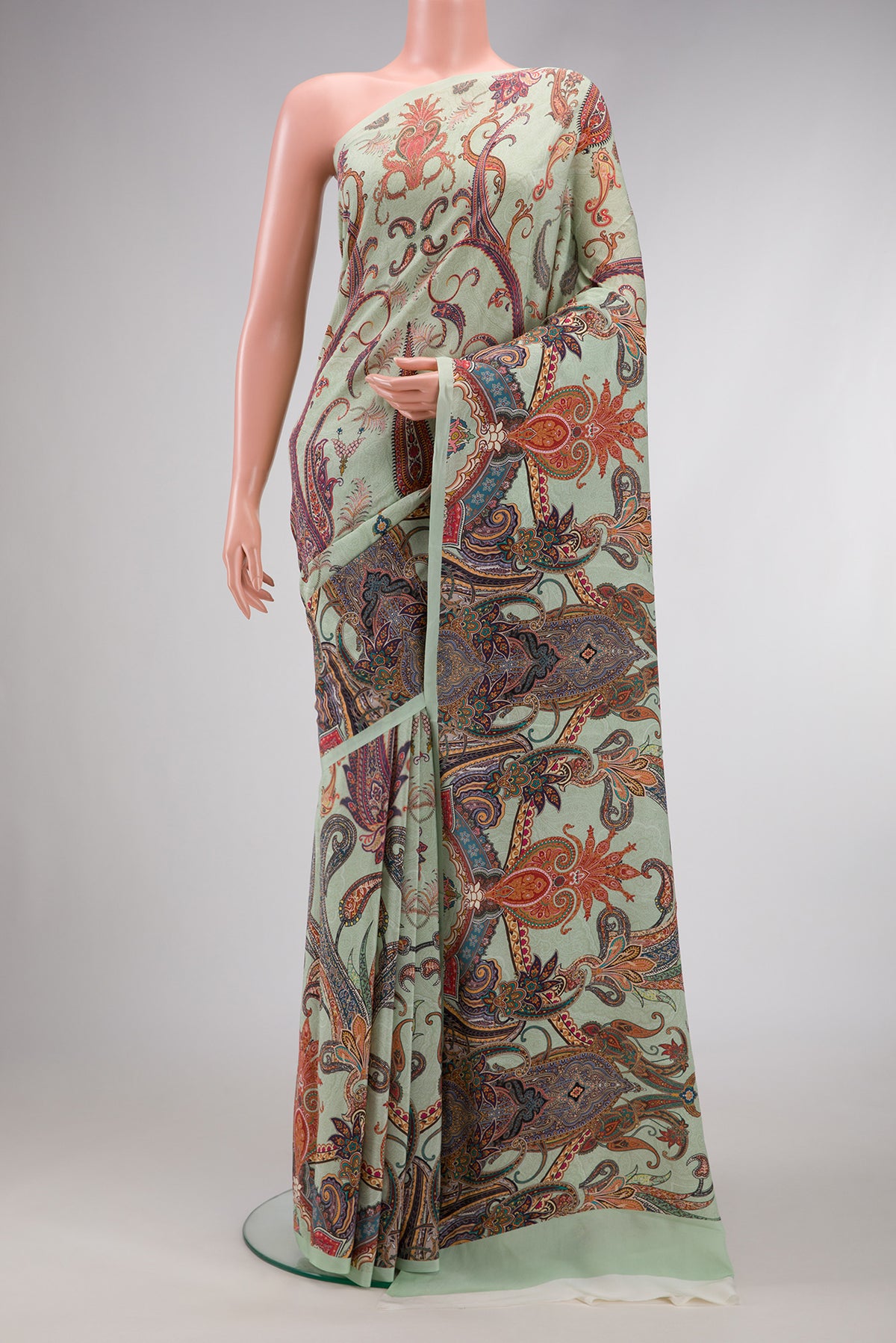 Light Green Dual Tone Mysore Crepe Saree with Printed design on the body and Without Border.  displayed on a mannequin