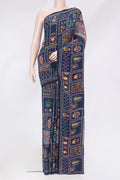 Navy Blue Crepe Saree with Printed design on the body and Without Border.  displayed on a mannequin