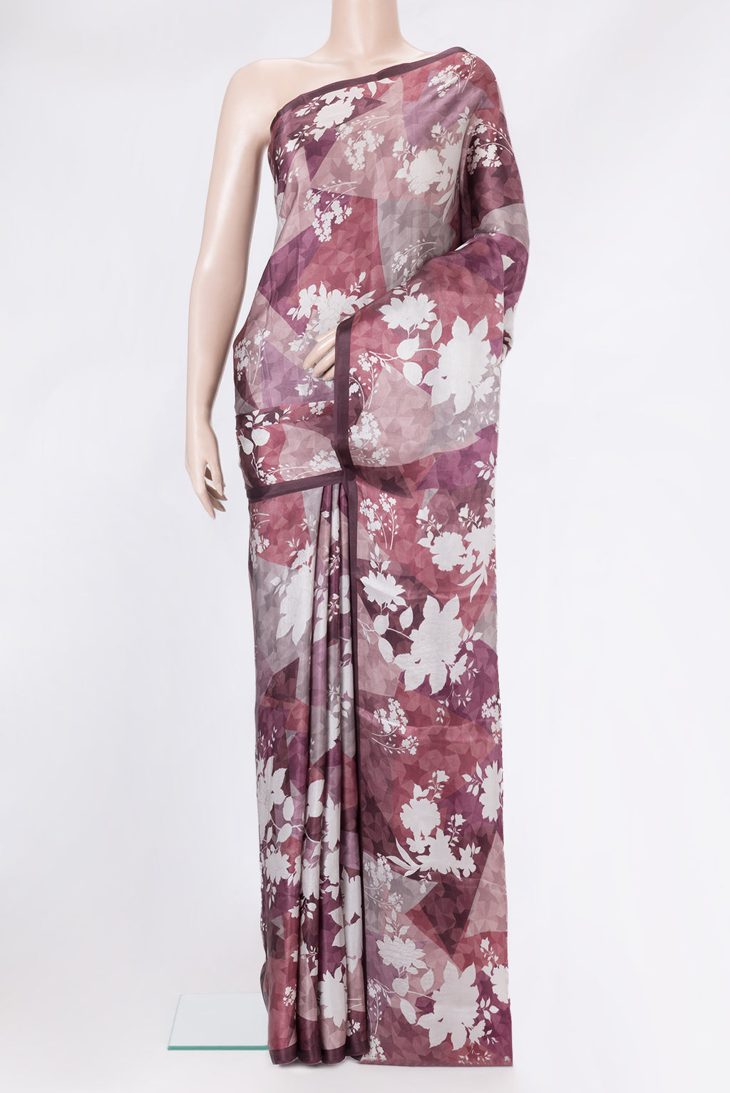Brown Dual Tone Crepe Saree with Printed design on the body and Plain Border.  displayed on a mannequin