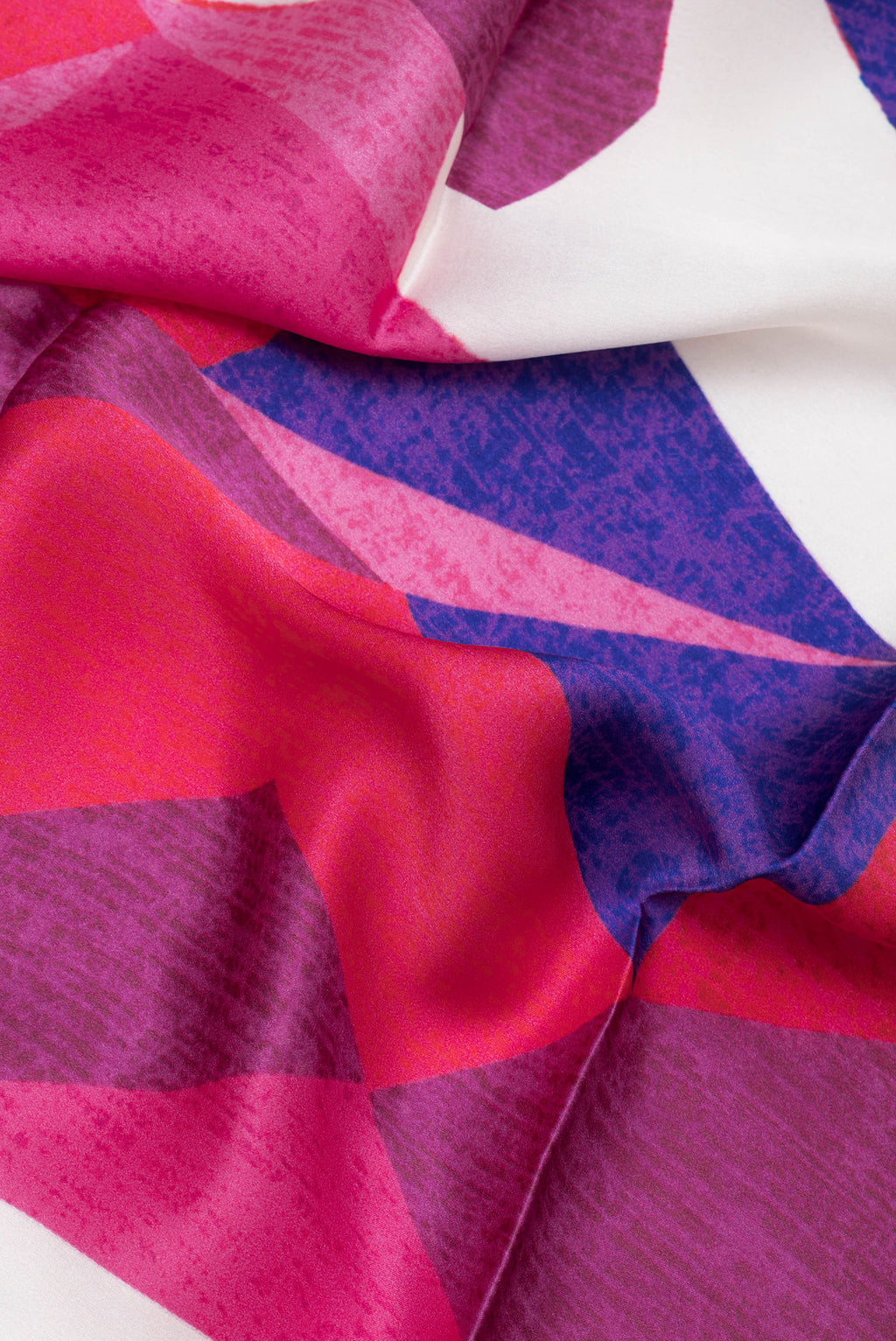 Close up of Multi Color Crepe Saree with Printed design on the body and Plain Border.  displaying folds
