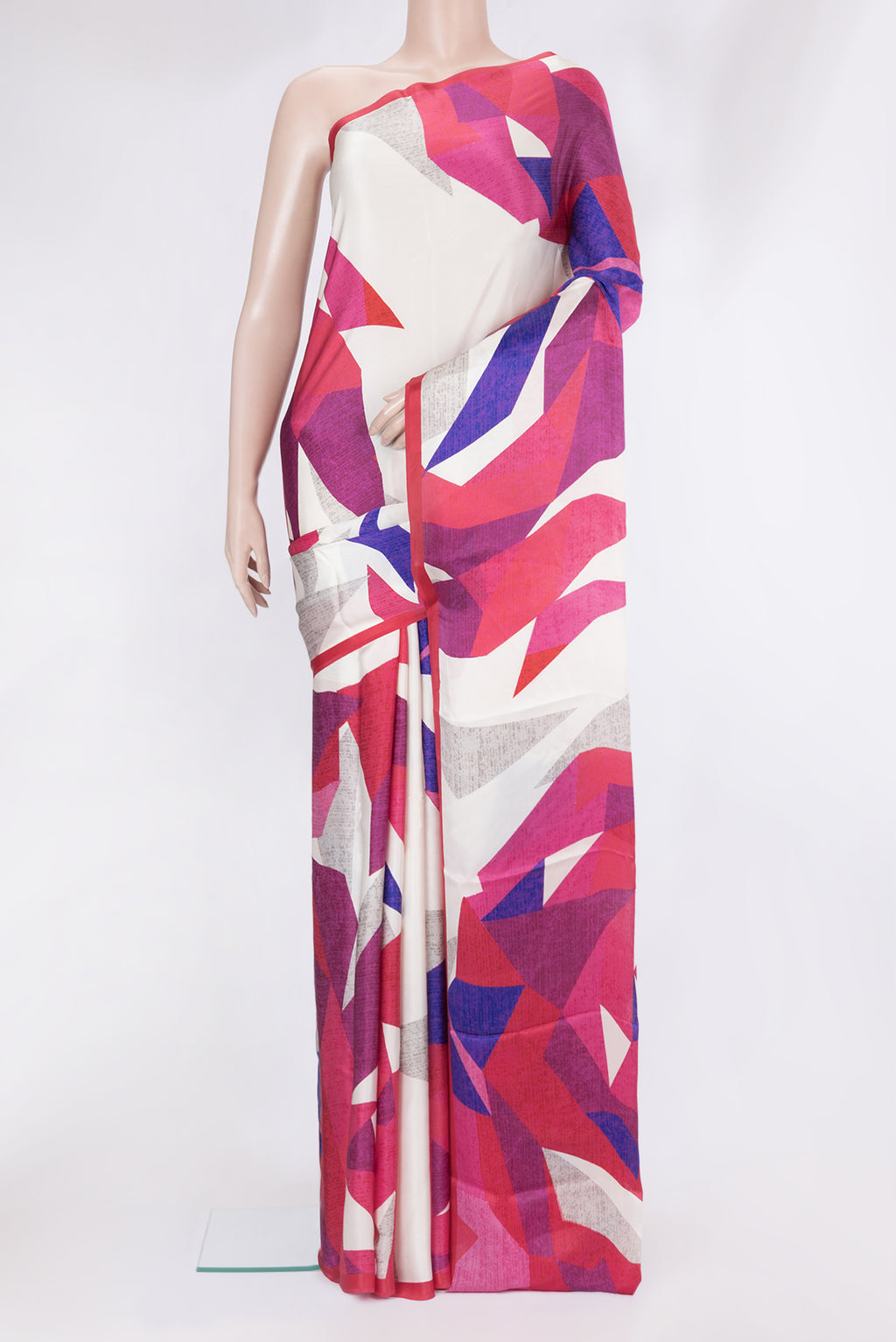 Multi Color Crepe Saree with Printed design on the body and Plain Border.  displayed on a mannequin