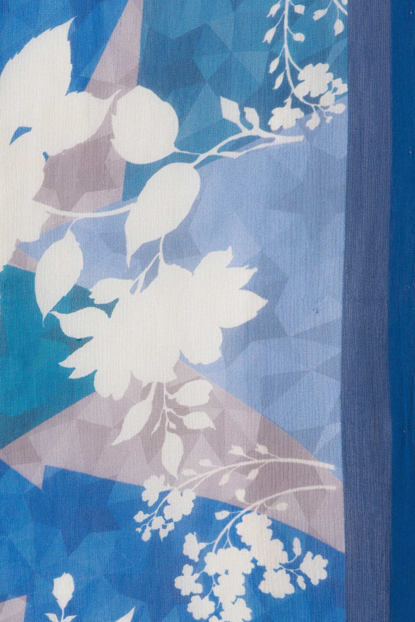 Border image of Navy Blue Dual Tone Mysore Chiffon Saree with Printed design on the body and Without Border. 
