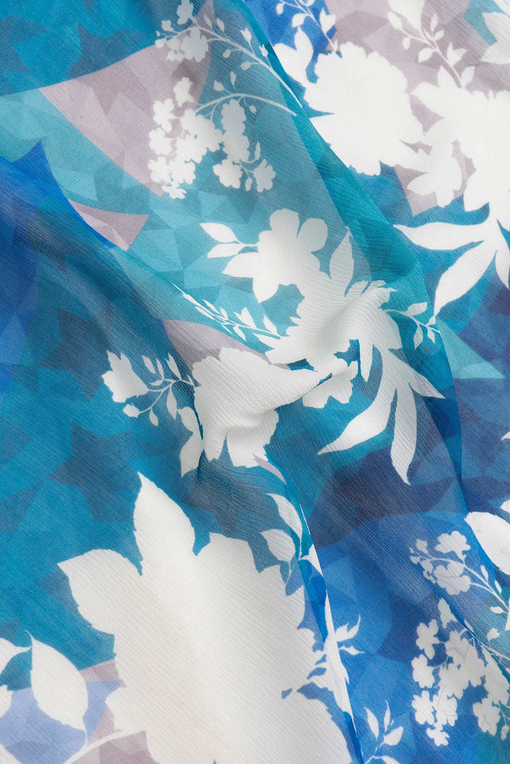 Close up of Navy Blue Dual Tone Mysore Chiffon Saree with Printed design on the body and Without Border.  displaying folds