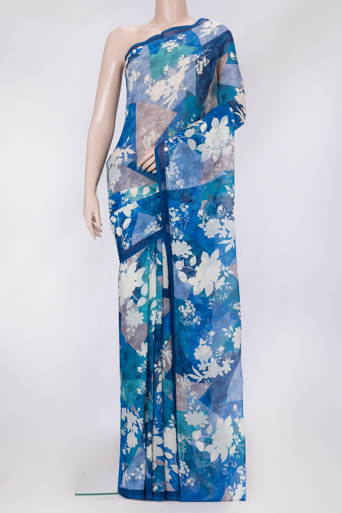 Navy Blue Dual Tone Mysore Chiffon Saree with Printed design on the body and Without Border.  displayed on a mannequin