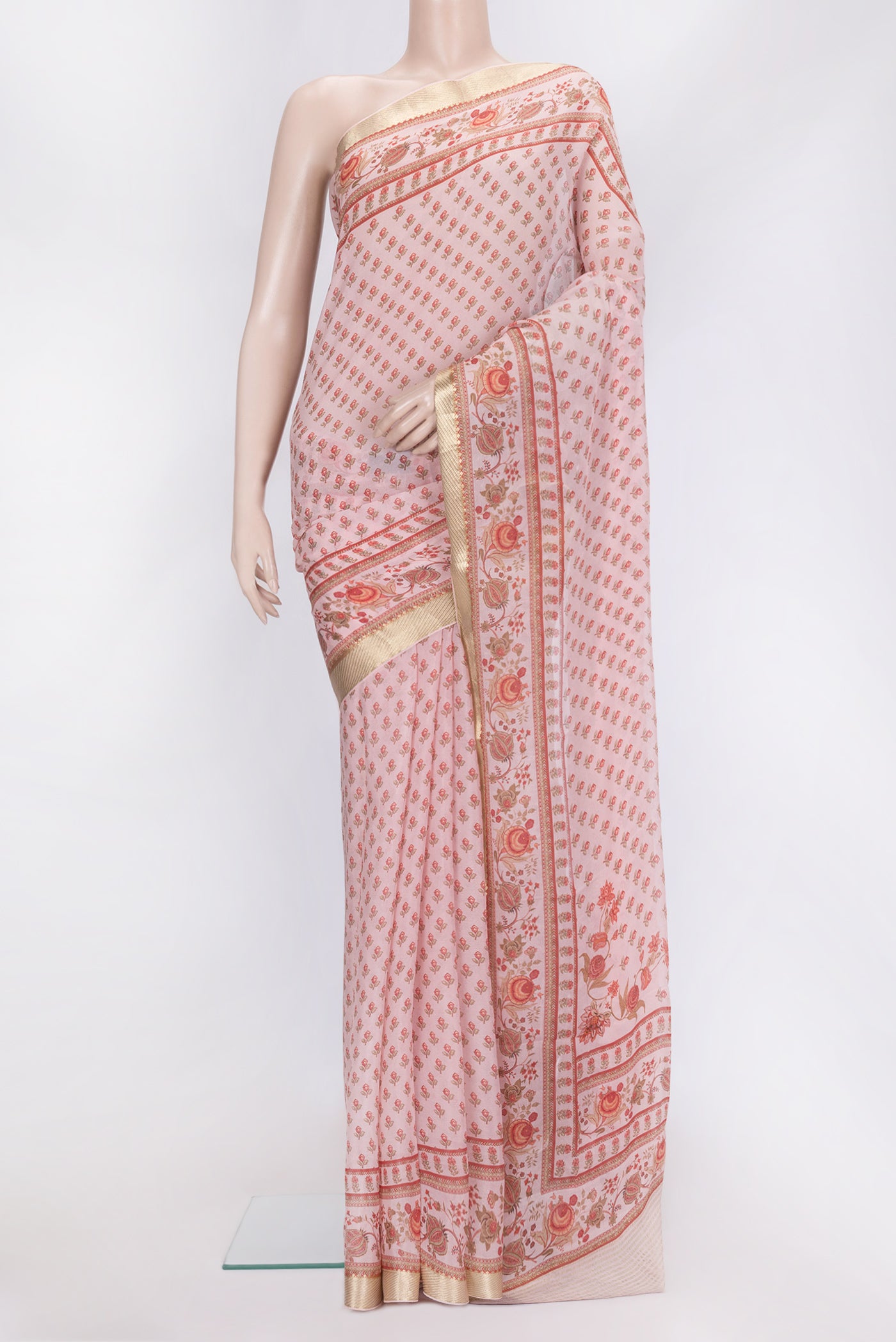 Rose Gold Dual Tone Mysore Chiffon Saree with Printed design on the body and Zari Border.  displayed on a mannequin