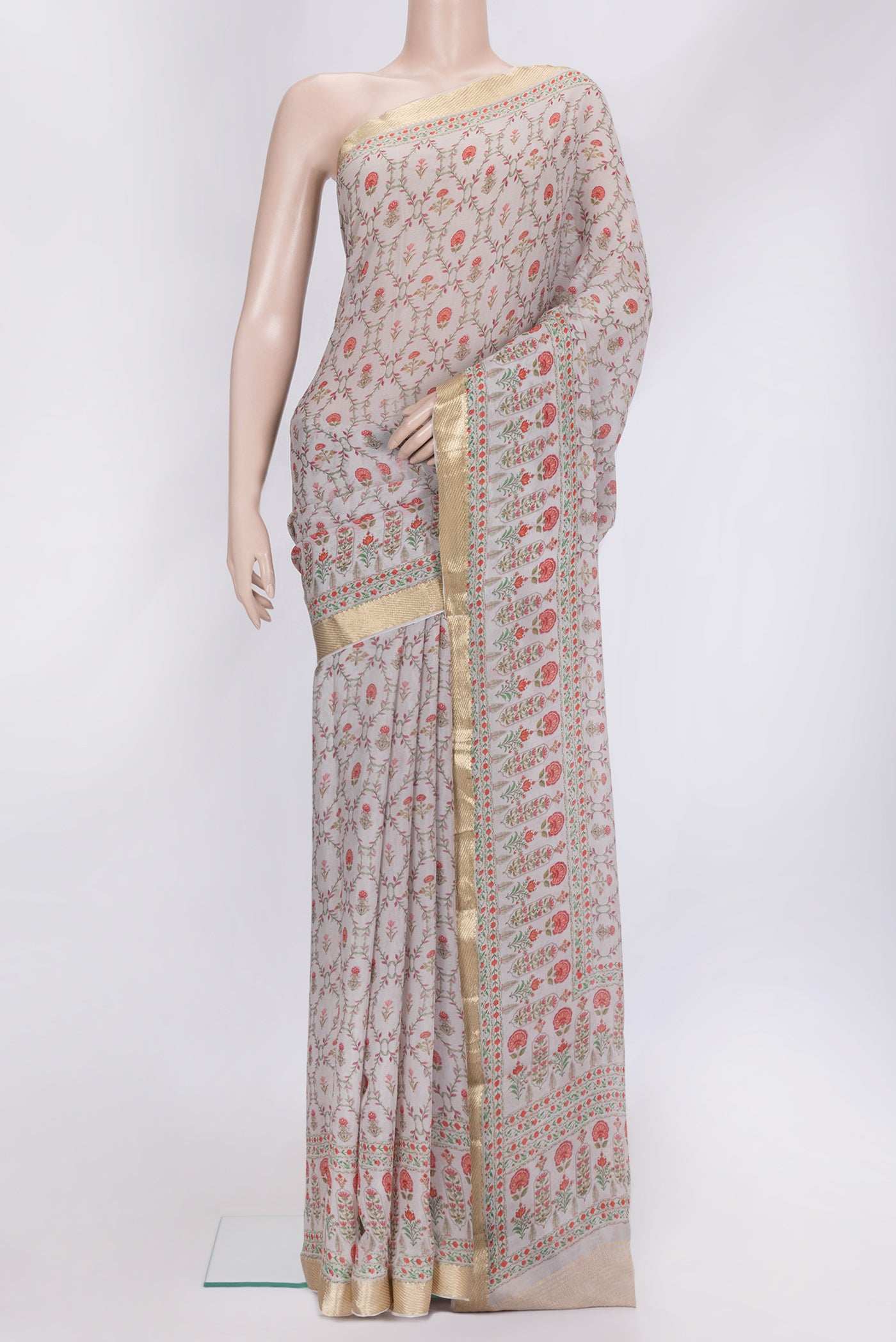 Grey Dual Tone Mysore Chiffon Saree with Printed design on the body and Zari Border.  displayed on a mannequin