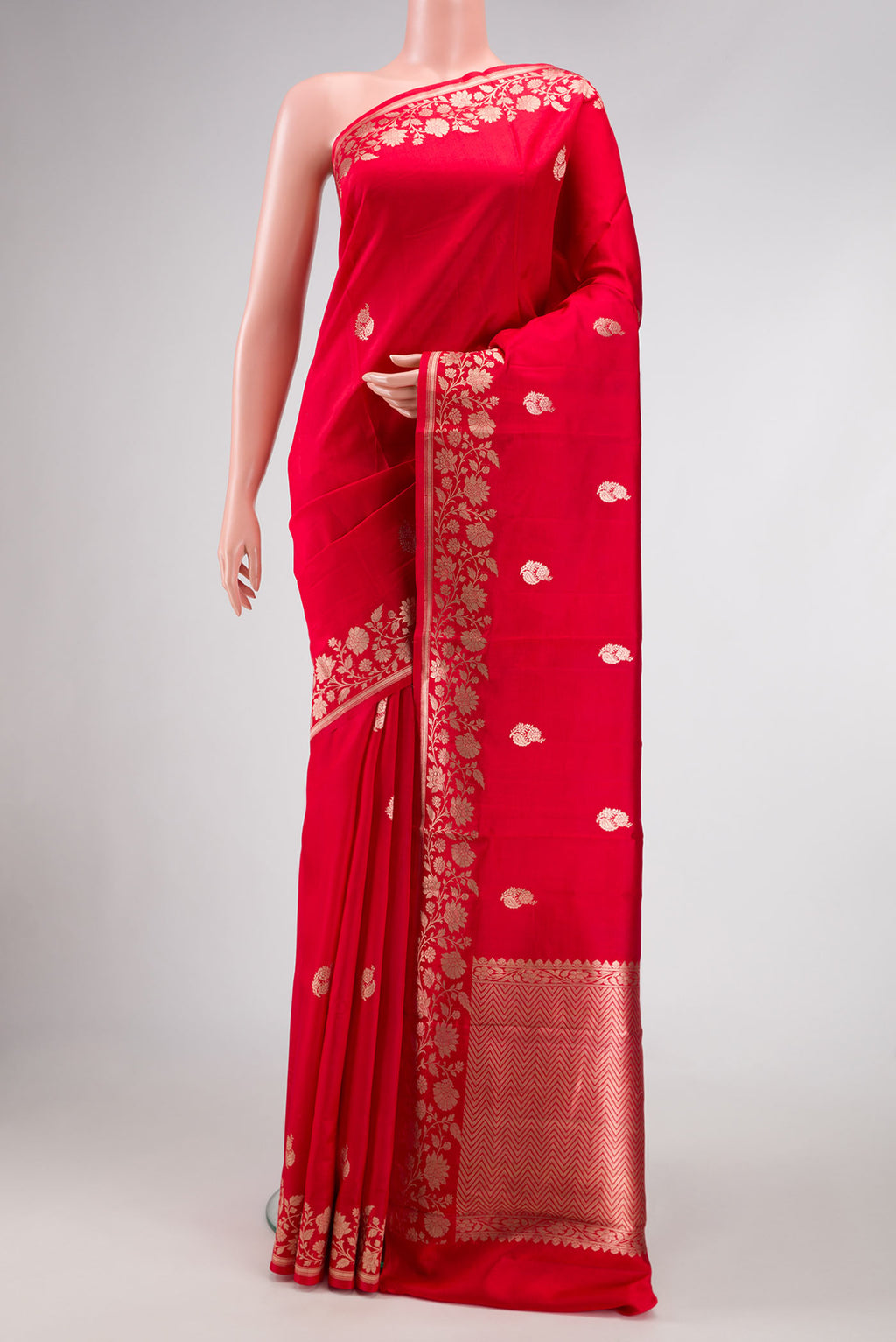 Red Dual Tone Tussar Silk Saree with Zari Butta on the body and Fancy Border.  displayed on a mannequin