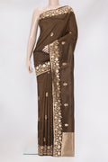 Brown Dual Tone Tussar Silk Saree with Zari Butta on the body and Zari Border.  displayed on a mannequin