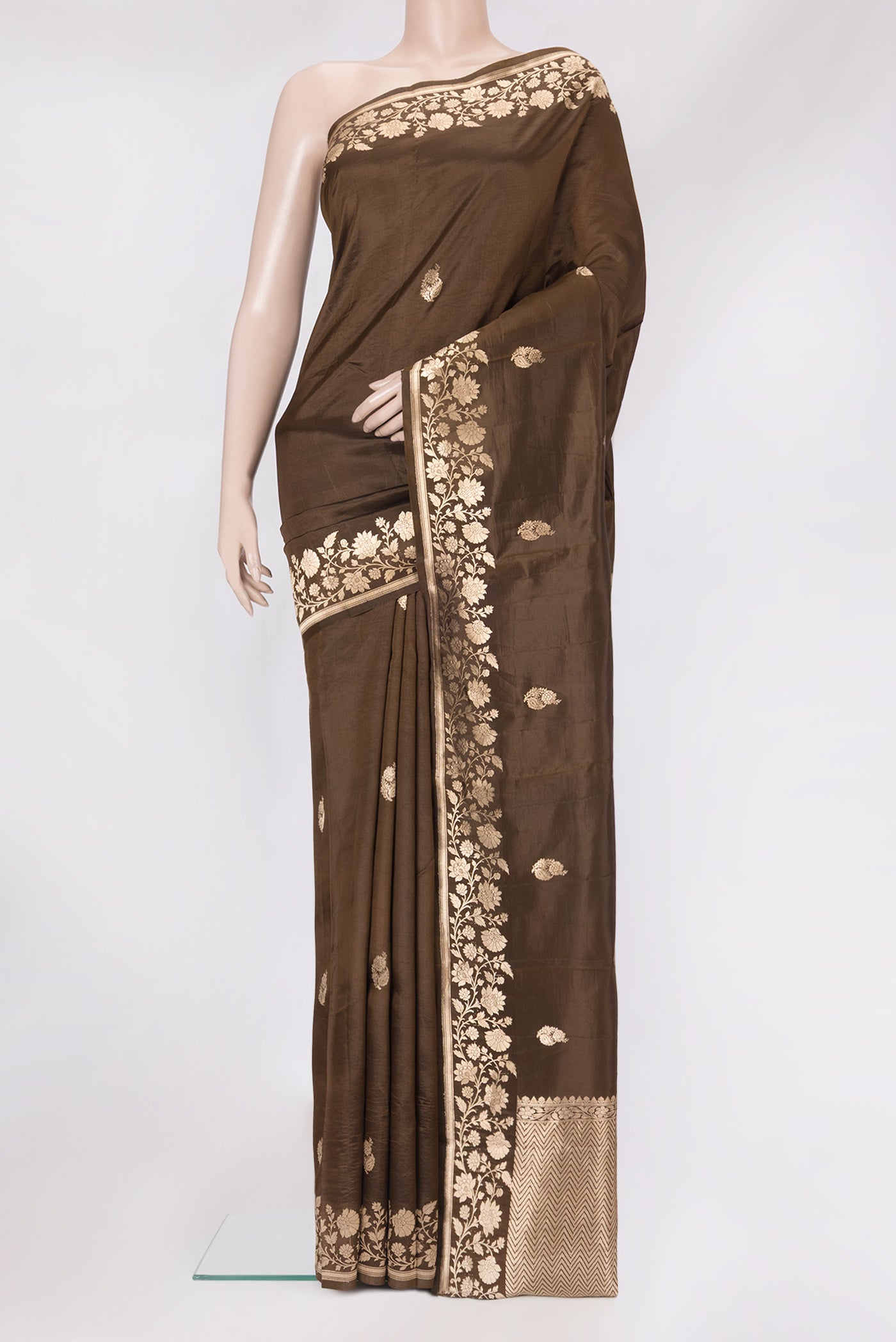 Brown Dual Tone Tussar Silk Saree with Zari Butta on the body and Zari Border.  displayed on a mannequin