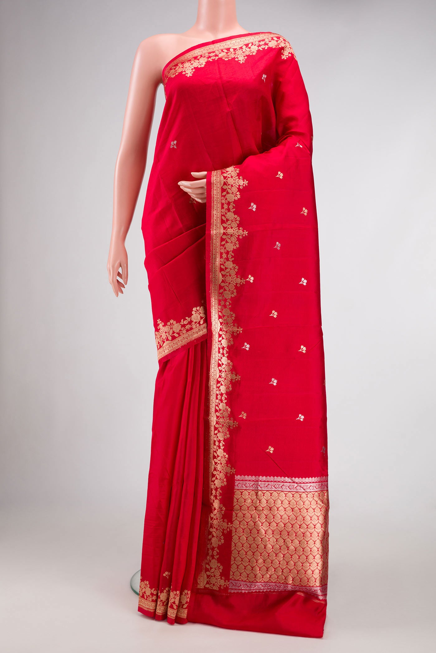 Red Dual Tone Tussar Silk Saree with Zari Butta on the body and Fancy Border.  displayed on a mannequin