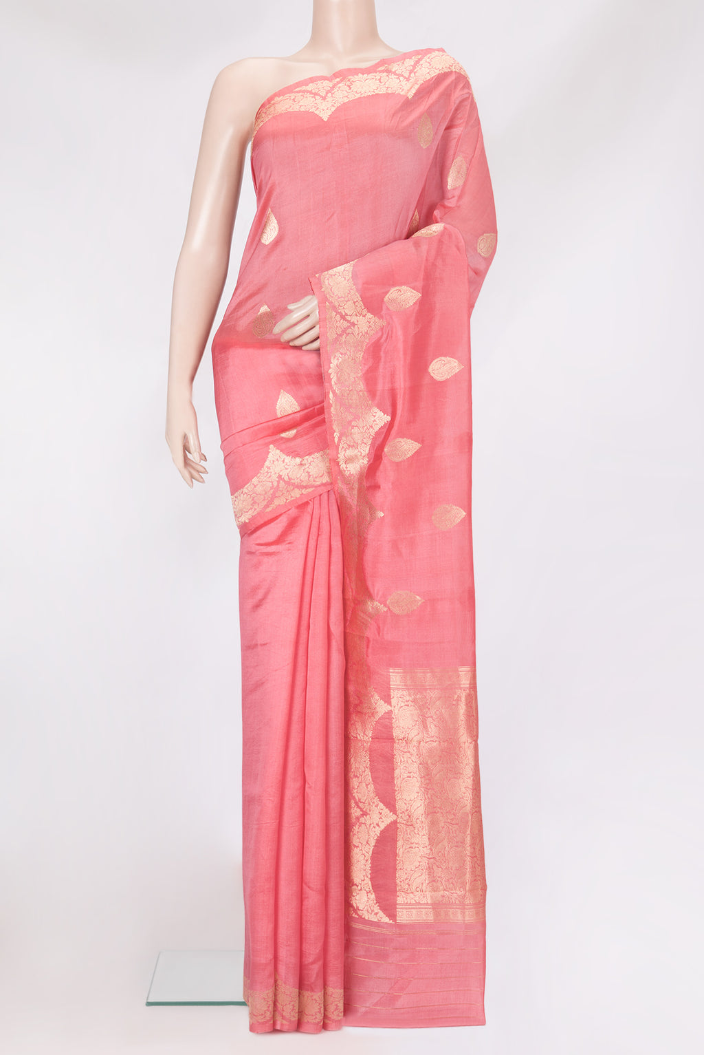 Golden Peach Dual Tone Tussar Silk Saree with Zari Butta on the body and Fancy Border.  displayed on a mannequin