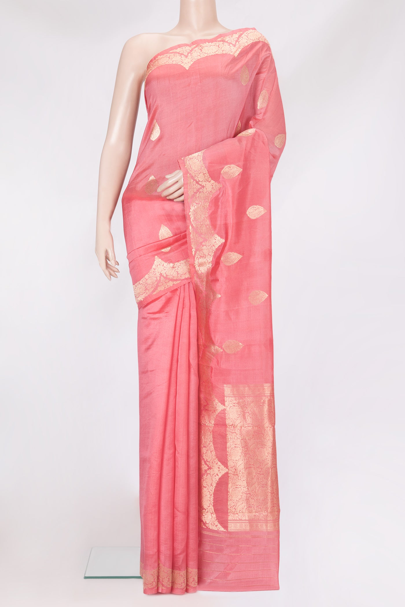 Golden Peach Dual Tone Tussar Silk Saree with Zari Butta on the body and Fancy Border.  displayed on a mannequin
