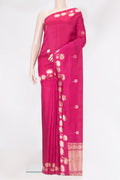 Dark Pink Dual Tone Tussar Silk Saree with Zari Butta on the body and Fancy Border.  displayed on a mannequin