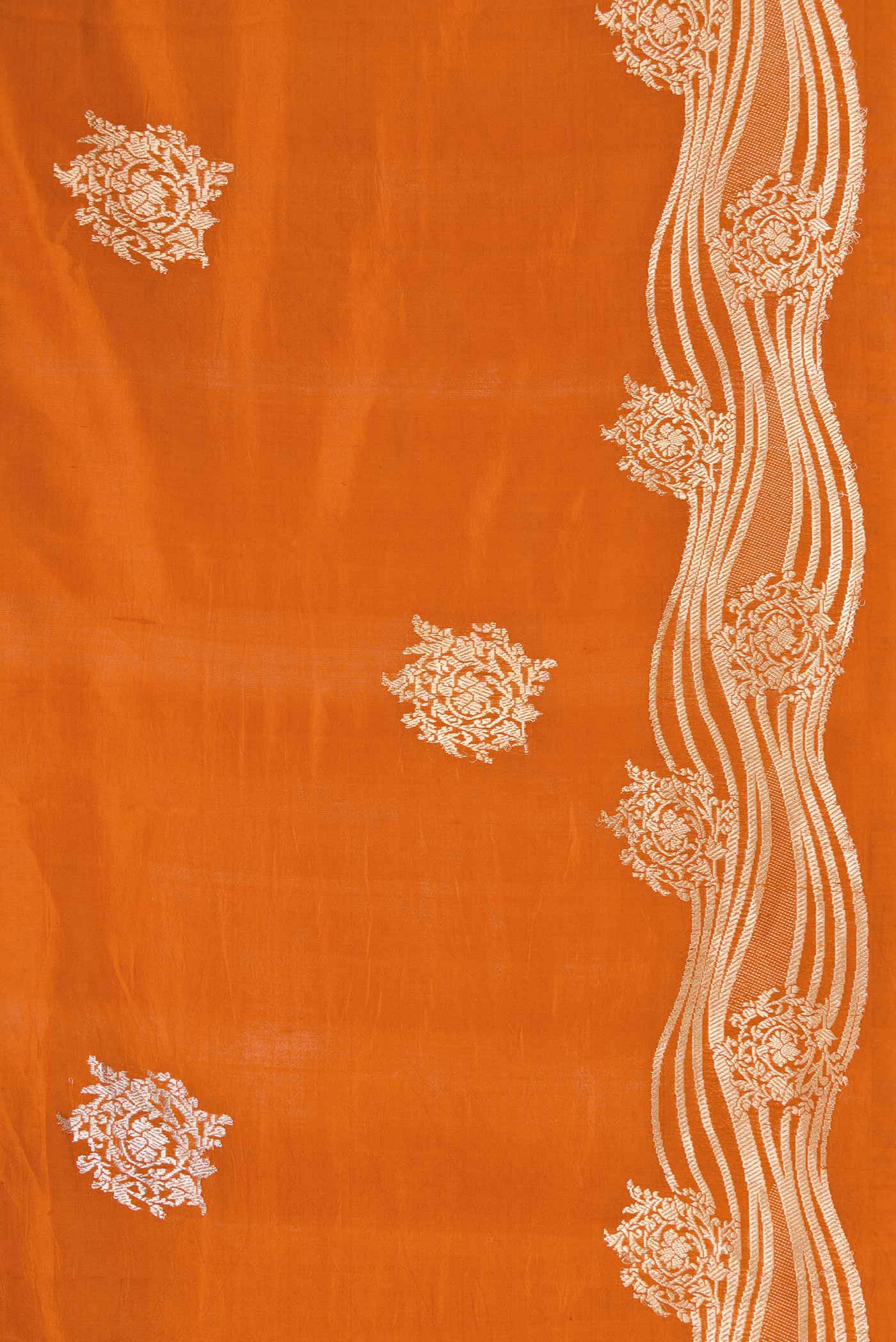 Border image of Orange Dual Tone Tussar Silk Saree with Zari Butta on the body and Fancy Border. 