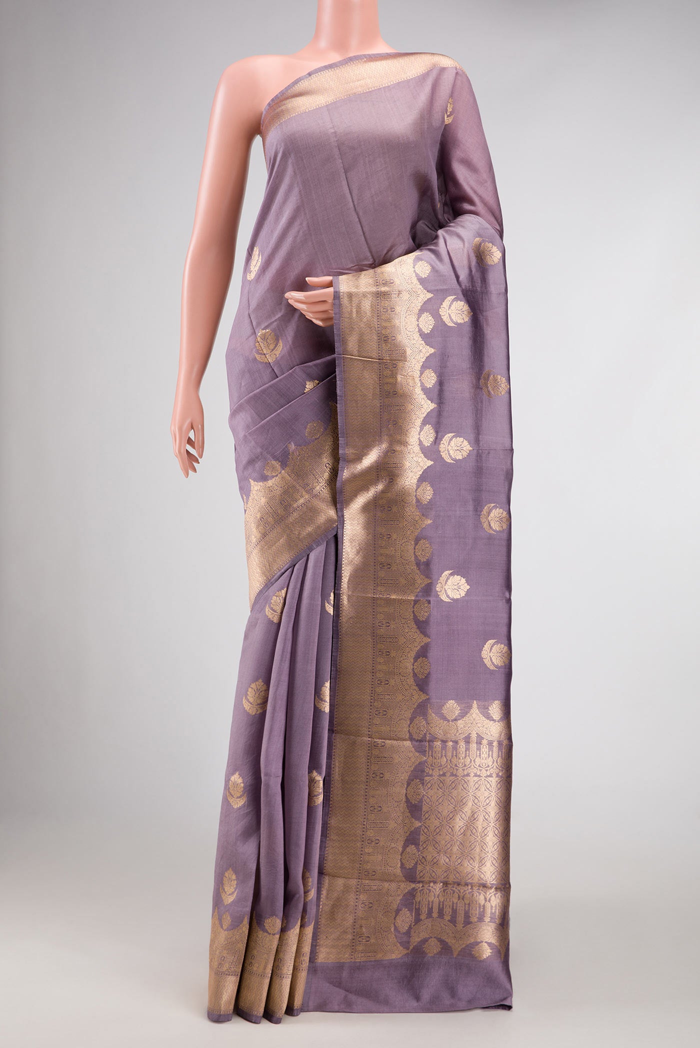 Purple Dual Tone Tussar Silk Saree with Zari Butta on the body and Fancy Border.  displayed on a mannequin