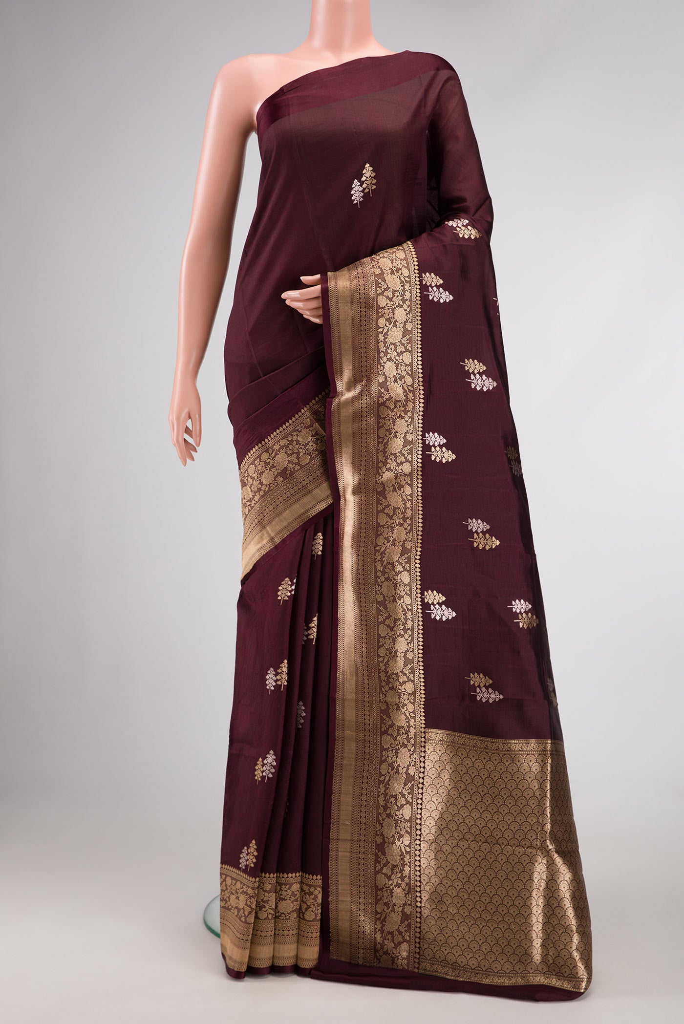 Coffee Brown Dual Tone Tussar Silk Saree with Zari Butta on the body and Fancy Border.  displayed on a mannequin