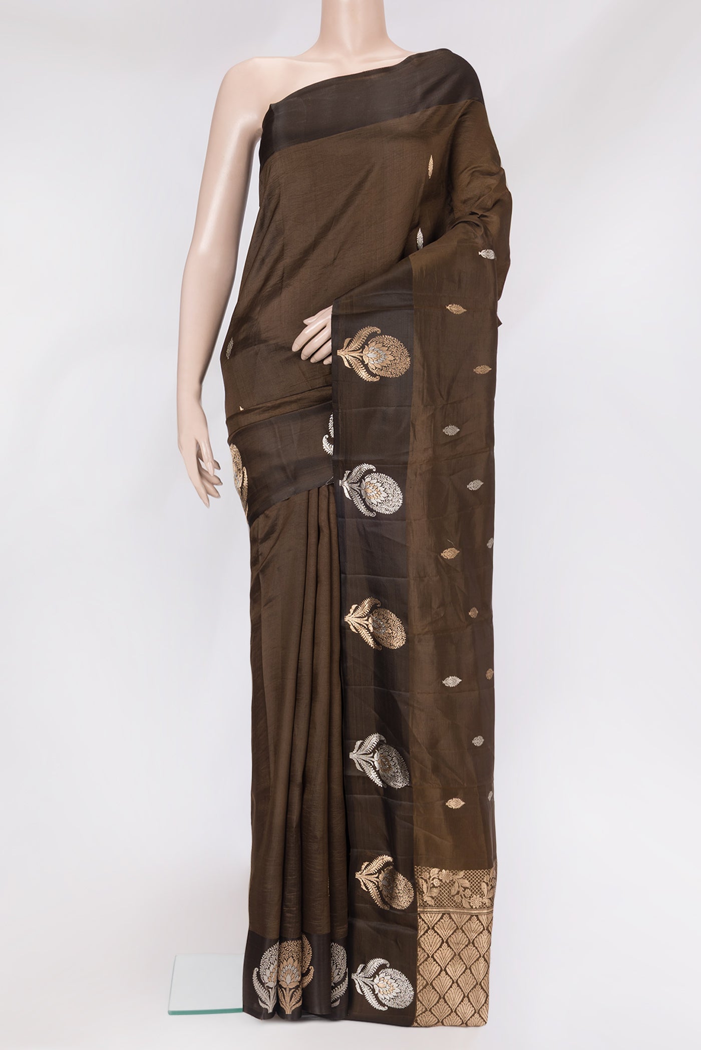 Brown Dual Tone Tussar Silk Saree with Zari Butta on the body and Fancy Border.  displayed on a mannequin