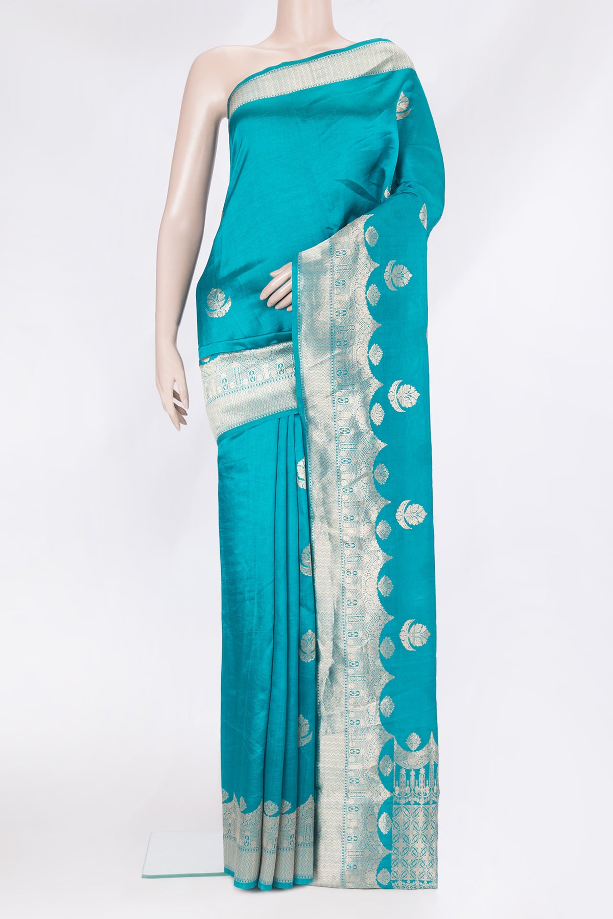 Sky Blue Tussar Silk Saree with Zari Butta on the body and Zari Border.  displayed on a mannequin