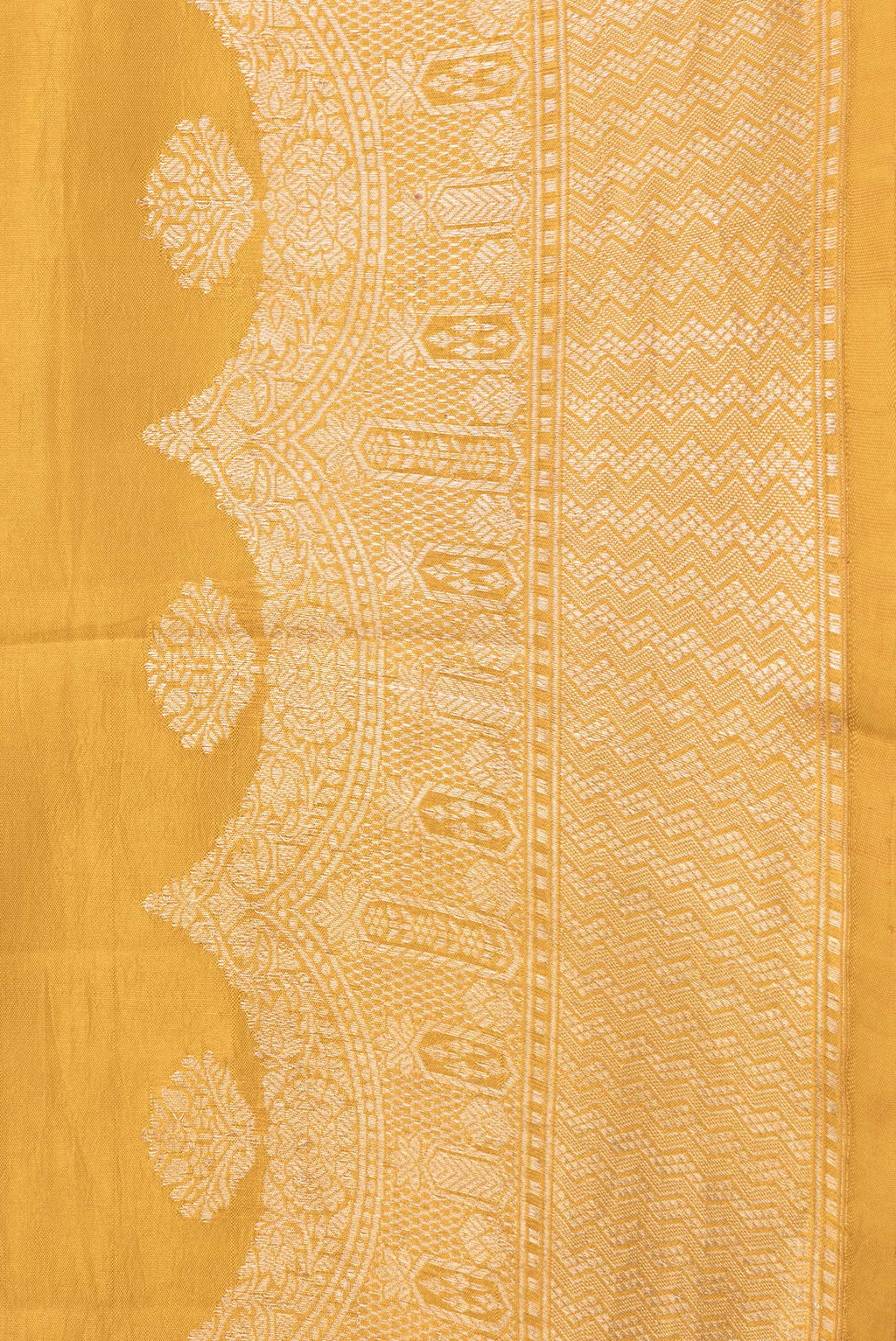 Border image of Mustard Dual Tone Tussar Silk Saree with Zari Butta on the body and Fancy Border. 