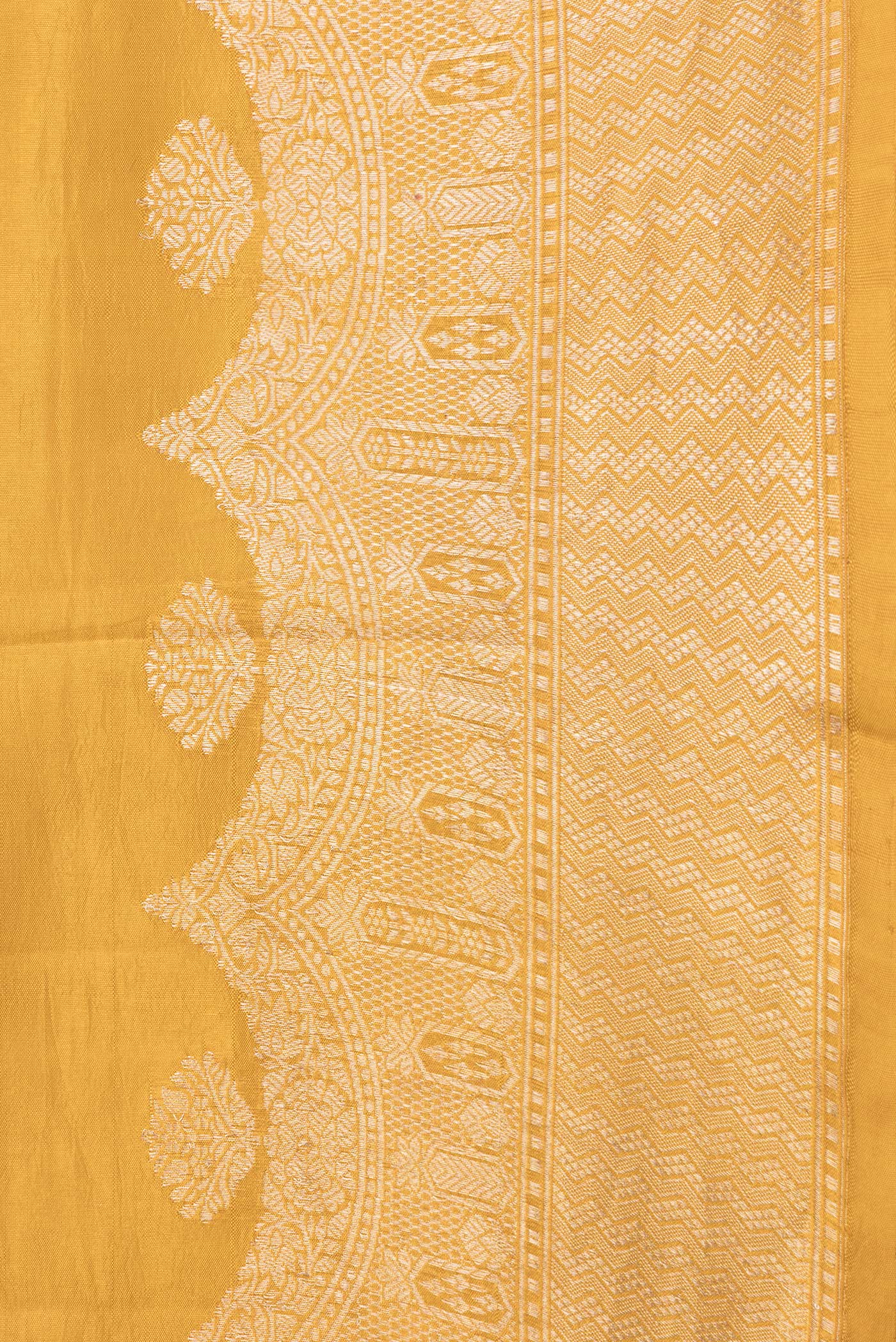 Border image of Mustard Dual Tone Tussar Silk Saree with Zari Butta on the body and Fancy Border. 