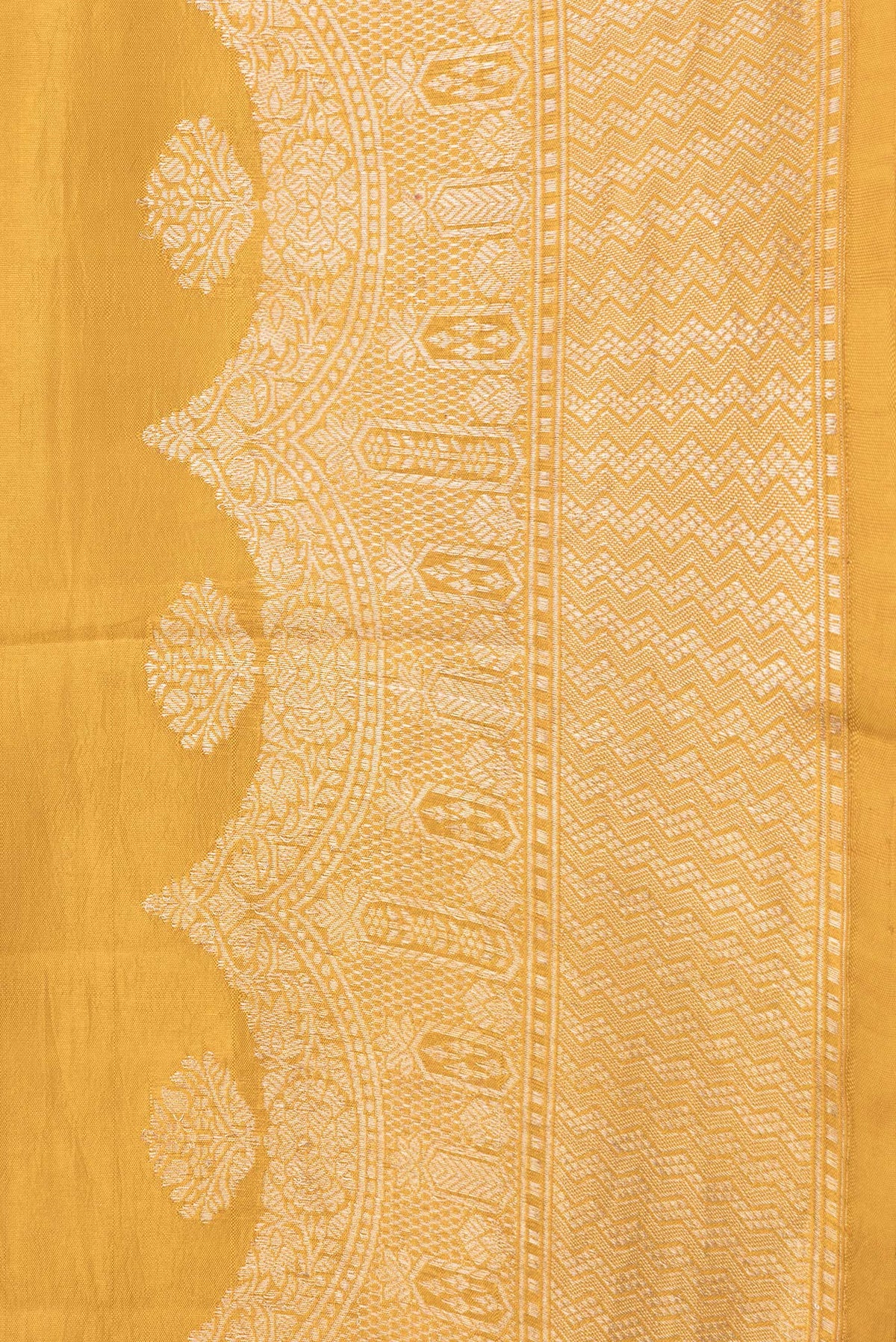 Border image of Mustard Dual Tone Tussar Silk Saree with Zari Butta on the body and Fancy Border. 
