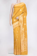 Mustard Dual Tone Tussar Silk Saree with Zari Butta on the body and Fancy Border.  displayed on a mannequin