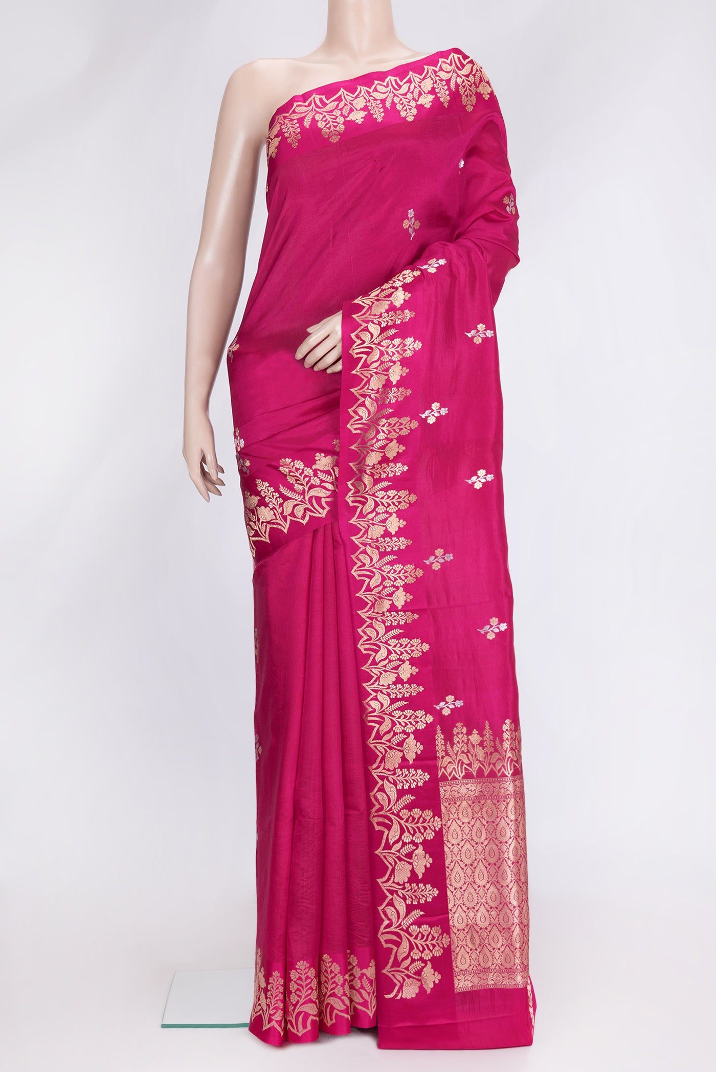 Pink Dual Tone Tussar Silk Saree with Zari Butta on the body and Fancy Border.  displayed on a mannequin
