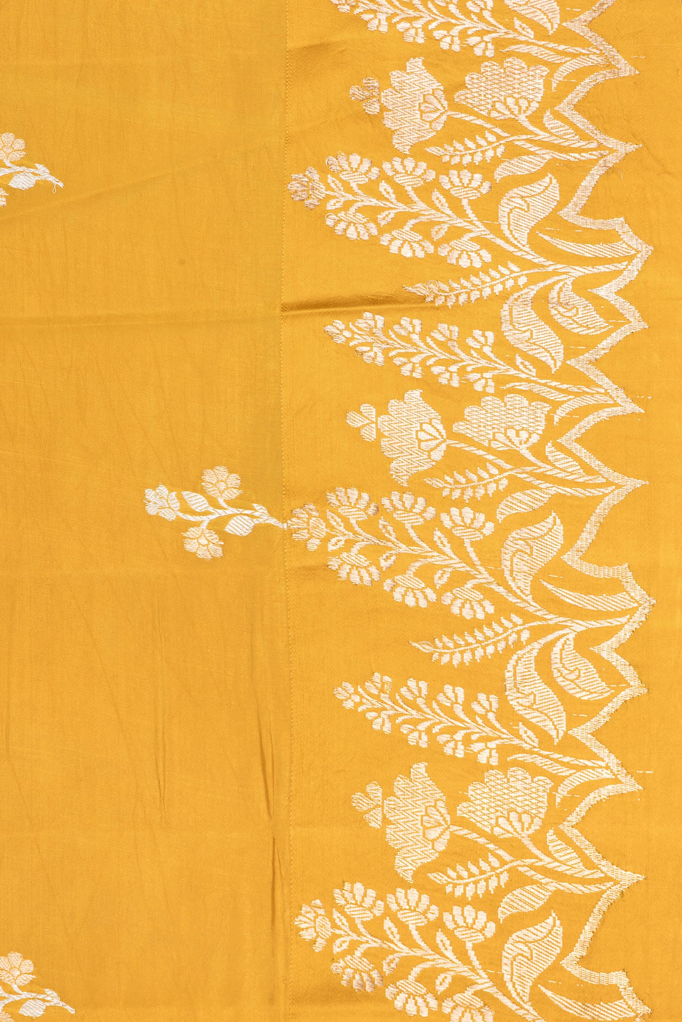 Border image of Mustard Dual Tone Tussar Silk Saree with Zari Butta on the body and Fancy Border. 