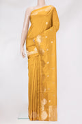 Mustard Dual Tone Tussar Silk Saree with Zari Butta on the body and Fancy Border.  displayed on a mannequin