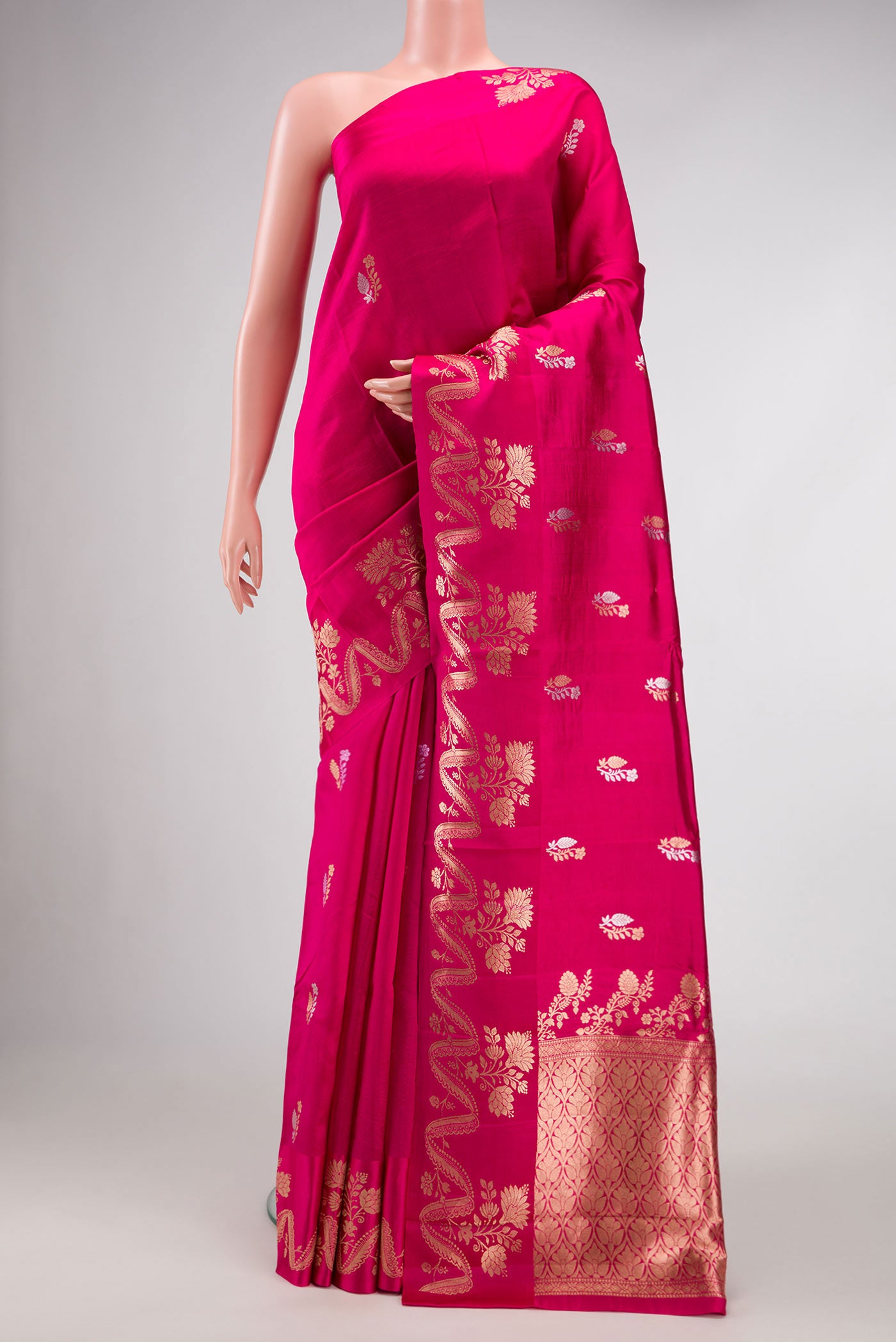 Pink Dual Tone Tussar Silk Saree with Zari Butta on the body and Fancy Border.  displayed on a mannequin