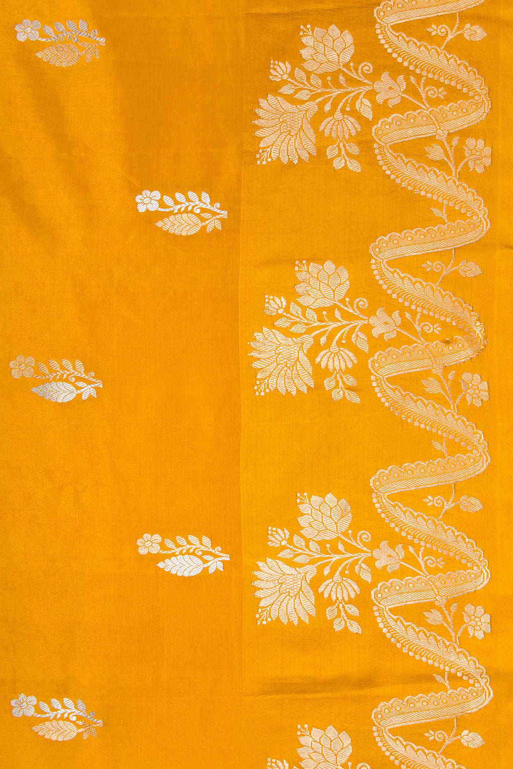Border image of Mustard Dual Tone Tussar Silk Saree with Zari Butta on the body and Fancy Border. 