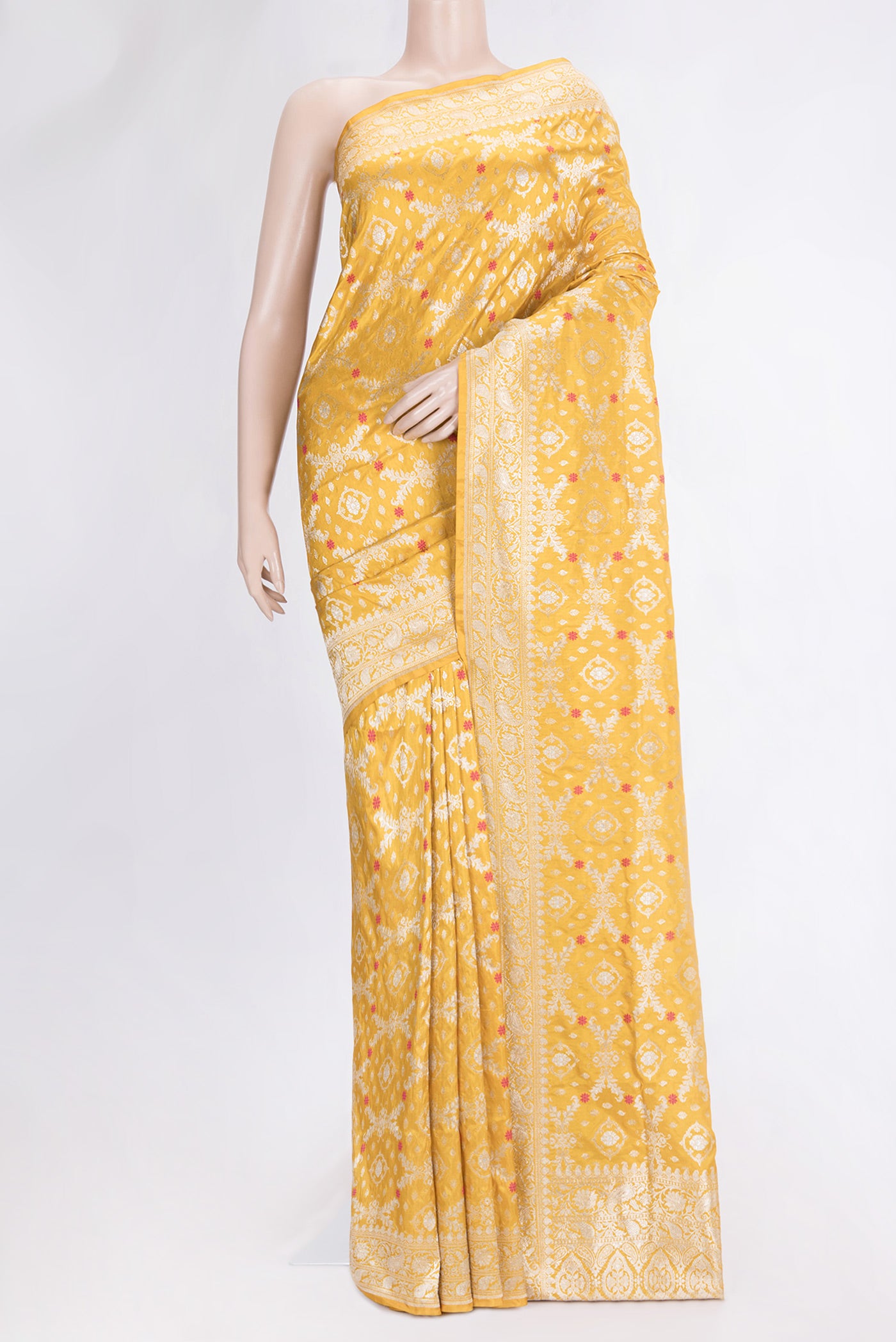 Mustard Dual Tone Banarasi Silk Saree with Zari Brocade on the body and Zari Border.  displayed on a mannequin