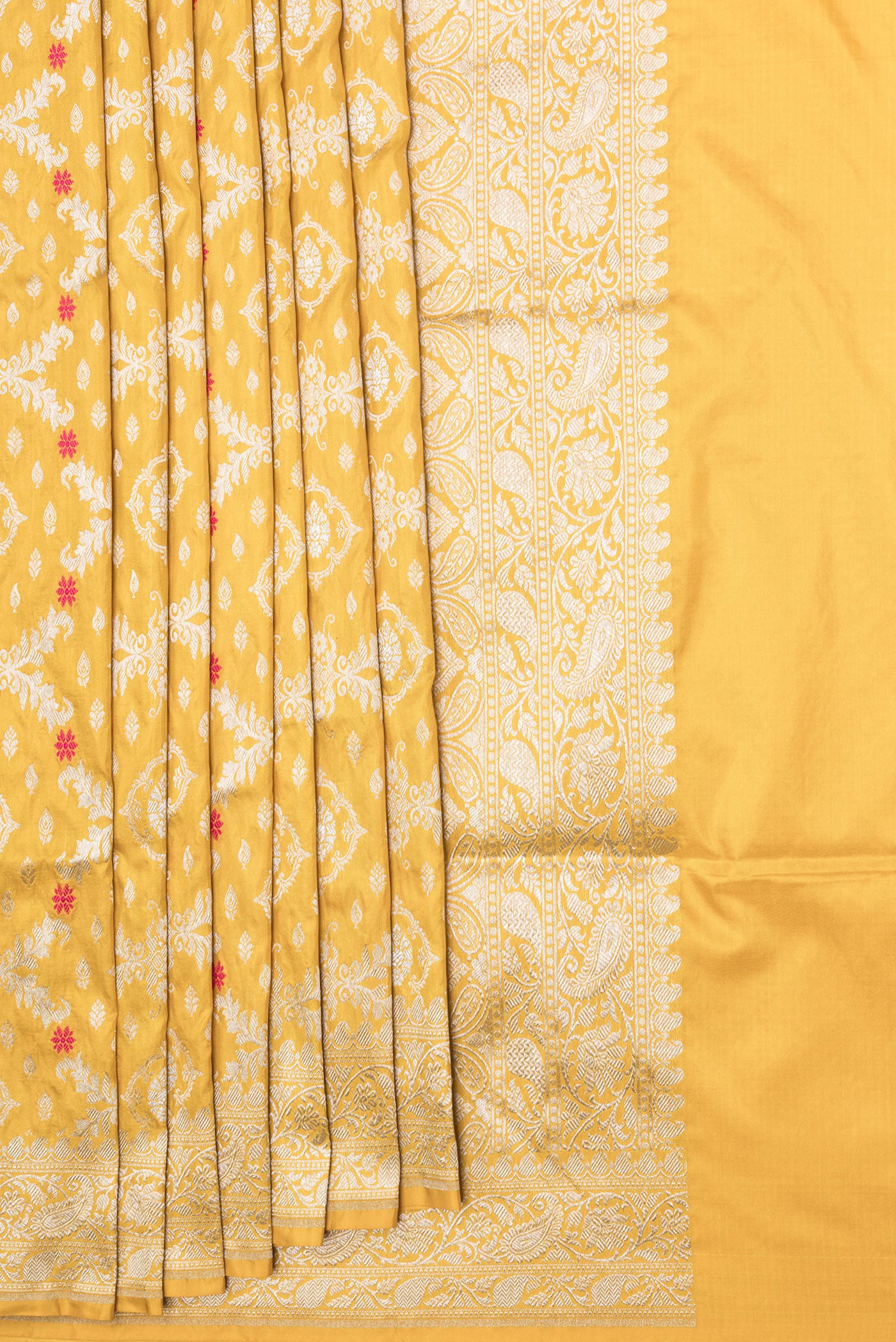 Pleats and pallu of Mustard Dual Tone Banarasi Silk Saree with Zari Brocade on the body and Zari Border. 