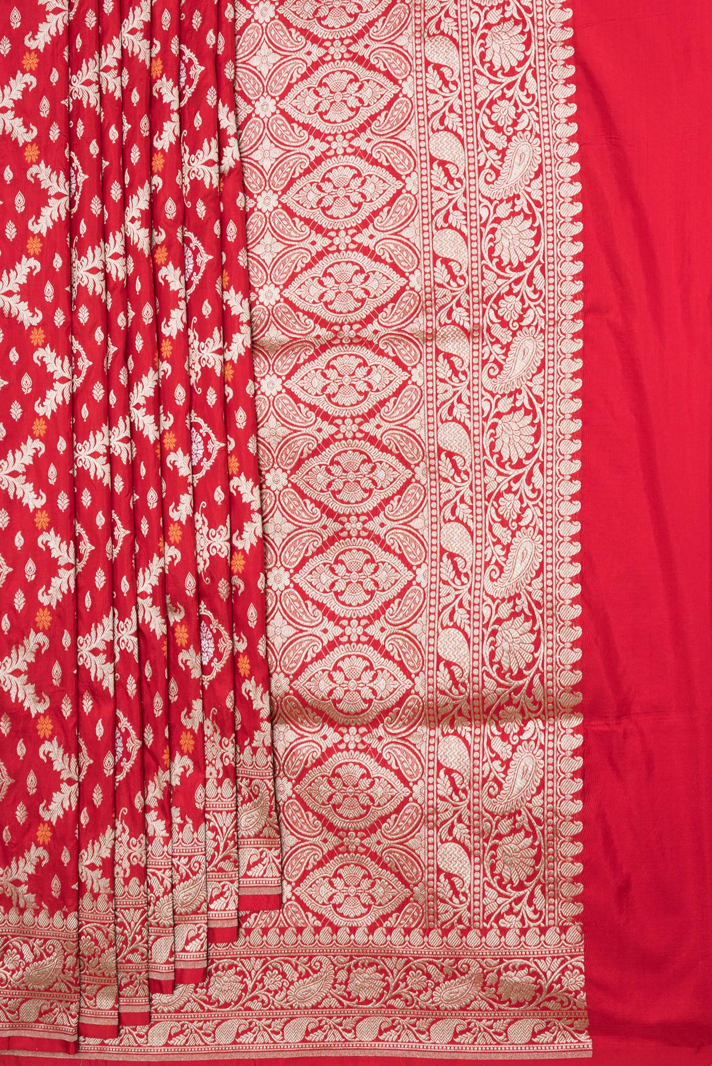 Pleats and pallu of Red Dual Tone Banarasi Silk Saree with Zari Brocade on the body and Zari Border. 