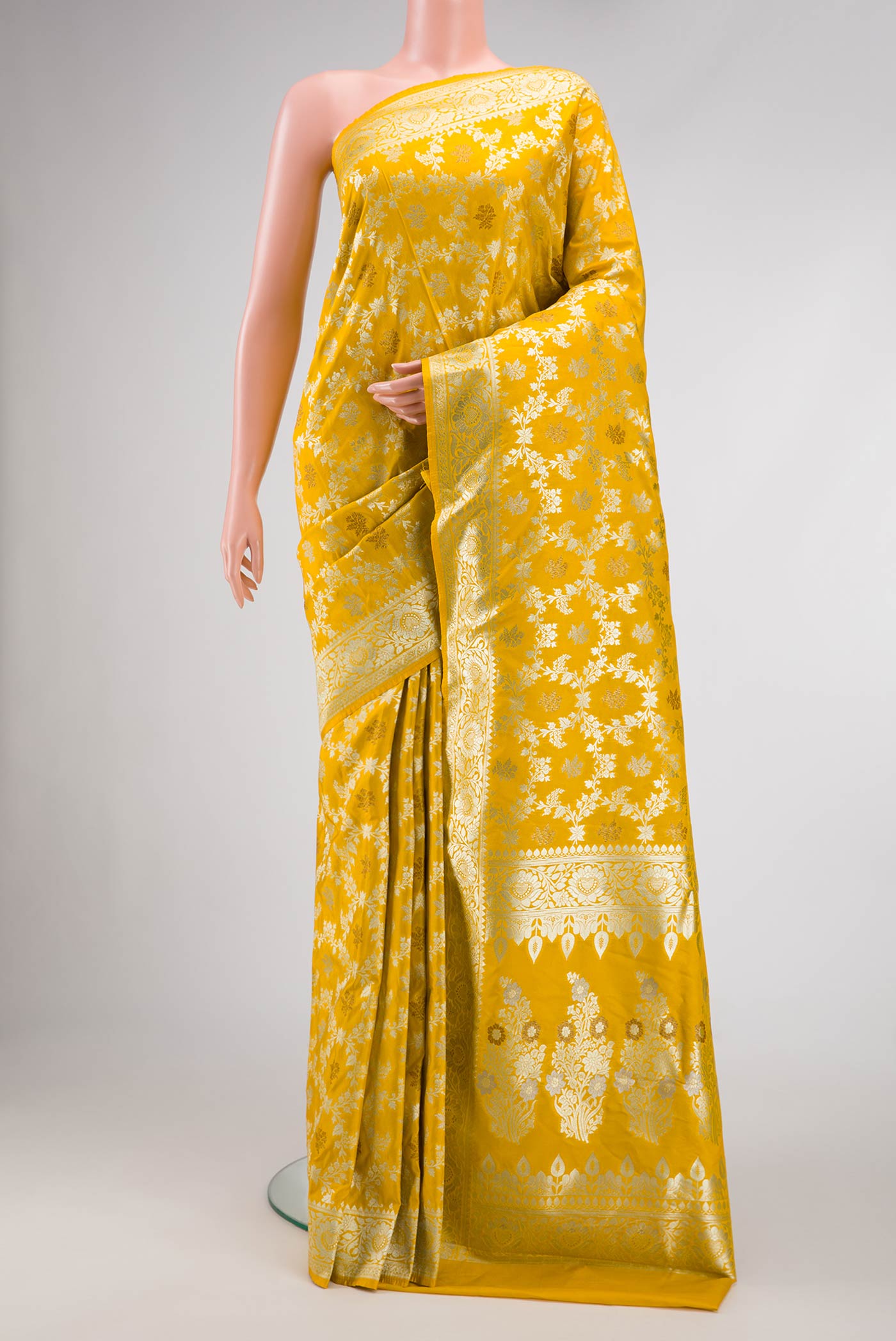 Yellow Dual Tone Blended Banarasi Silk Saree with Zari Brocade on the body and Zari Border.  displayed on a mannequin