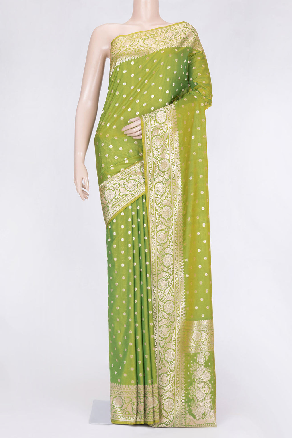 Parrot Green Dual Tone Blended Banarasi Saree with Zari Butta on the body and Zari Border.  displayed on a mannequin