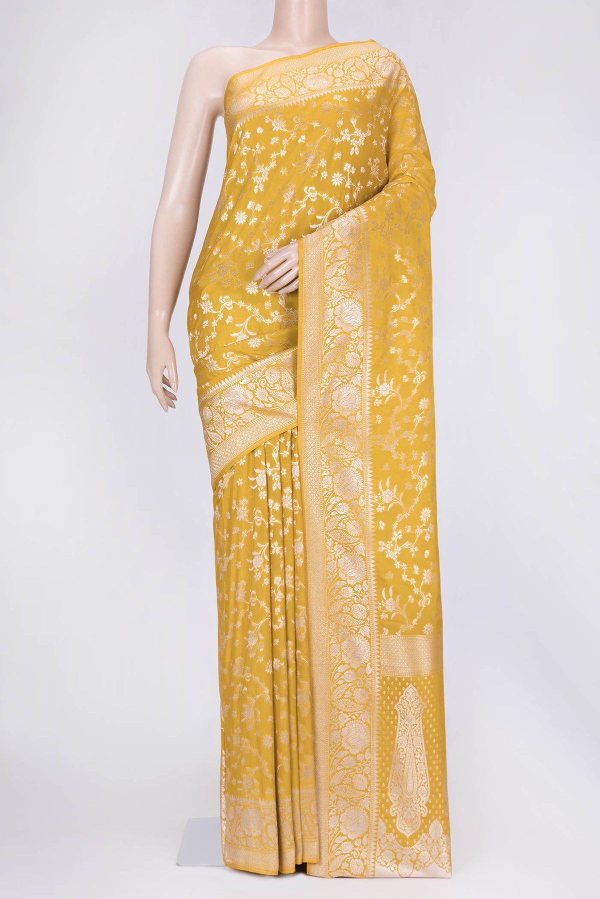 Yellow Dual Tone Blended Banarasi Saree with Zari Brocade on the body and Zari Border.  displayed on a mannequin