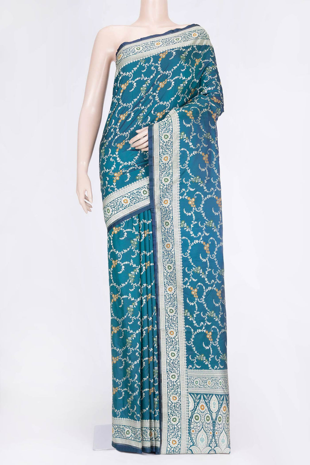 Peacock Blue Dual Tone Blended Banarasi Saree with Zari Brocade on the body and Zari Border.  displayed on a mannequin