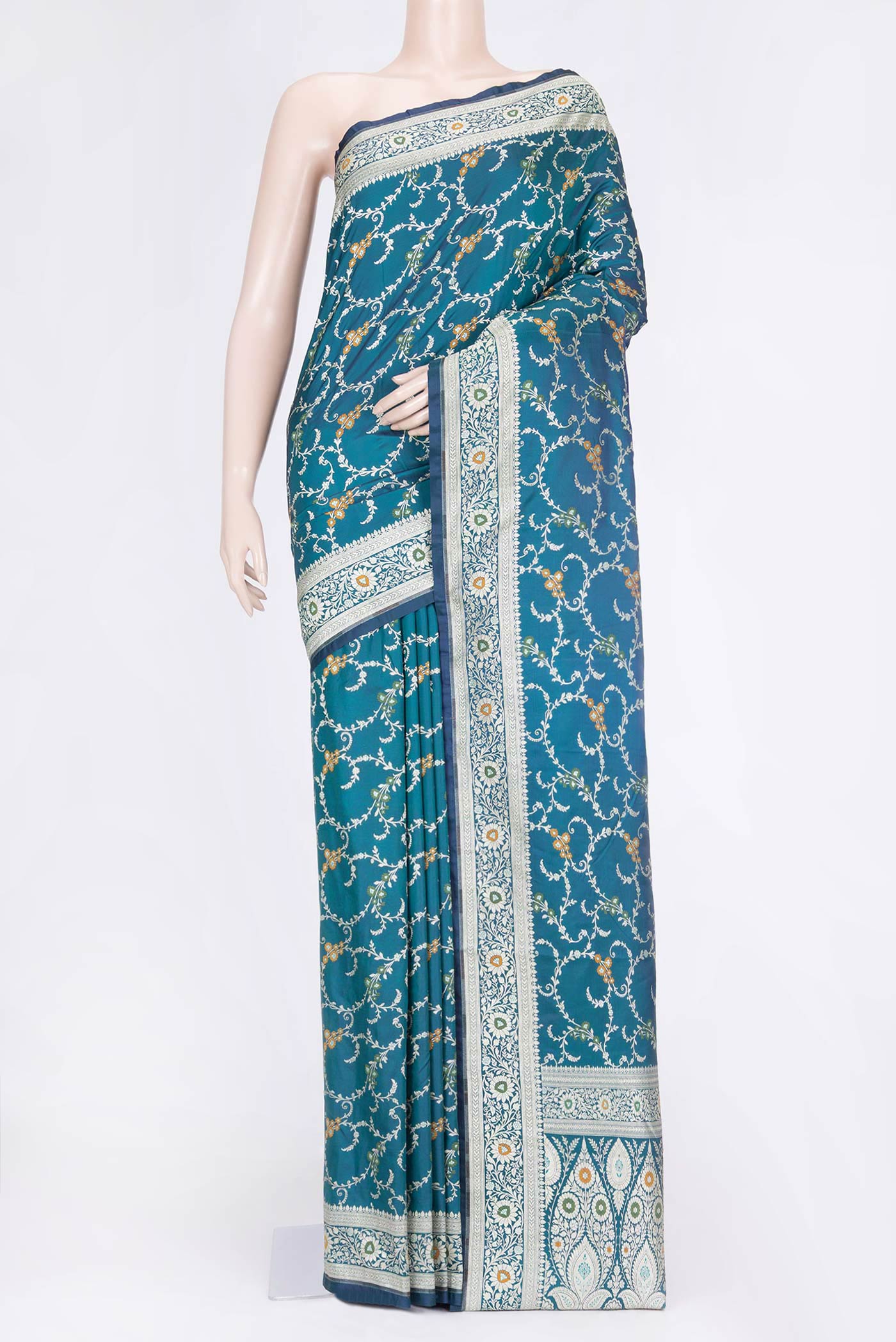 Peacock Blue Dual Tone Blended Banarasi Saree with Zari Brocade on the body and Zari Border.  displayed on a mannequin