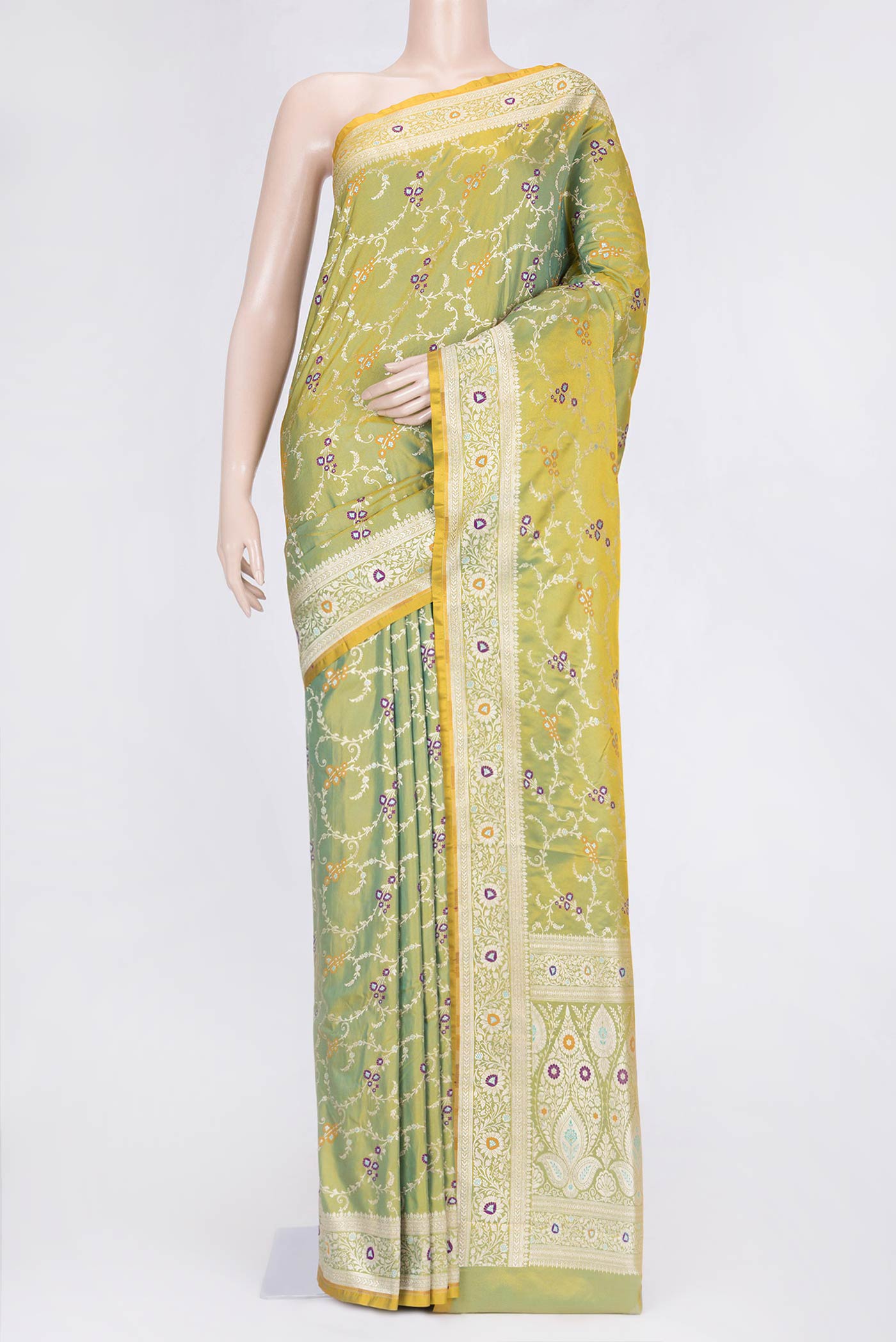 Parrot Green Dual Tone Blended Banarasi Saree with Zari Brocade on the body and Zari Border.  displayed on a mannequin