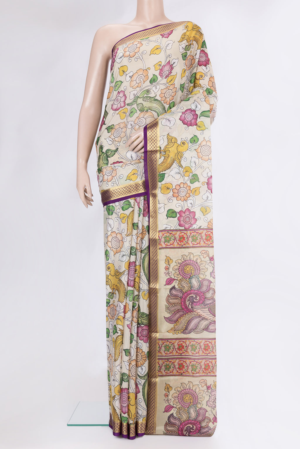 Beige Mysore Silk Saree with kalamkari Print on the body and Fancy Border.  displayed on a mannequin