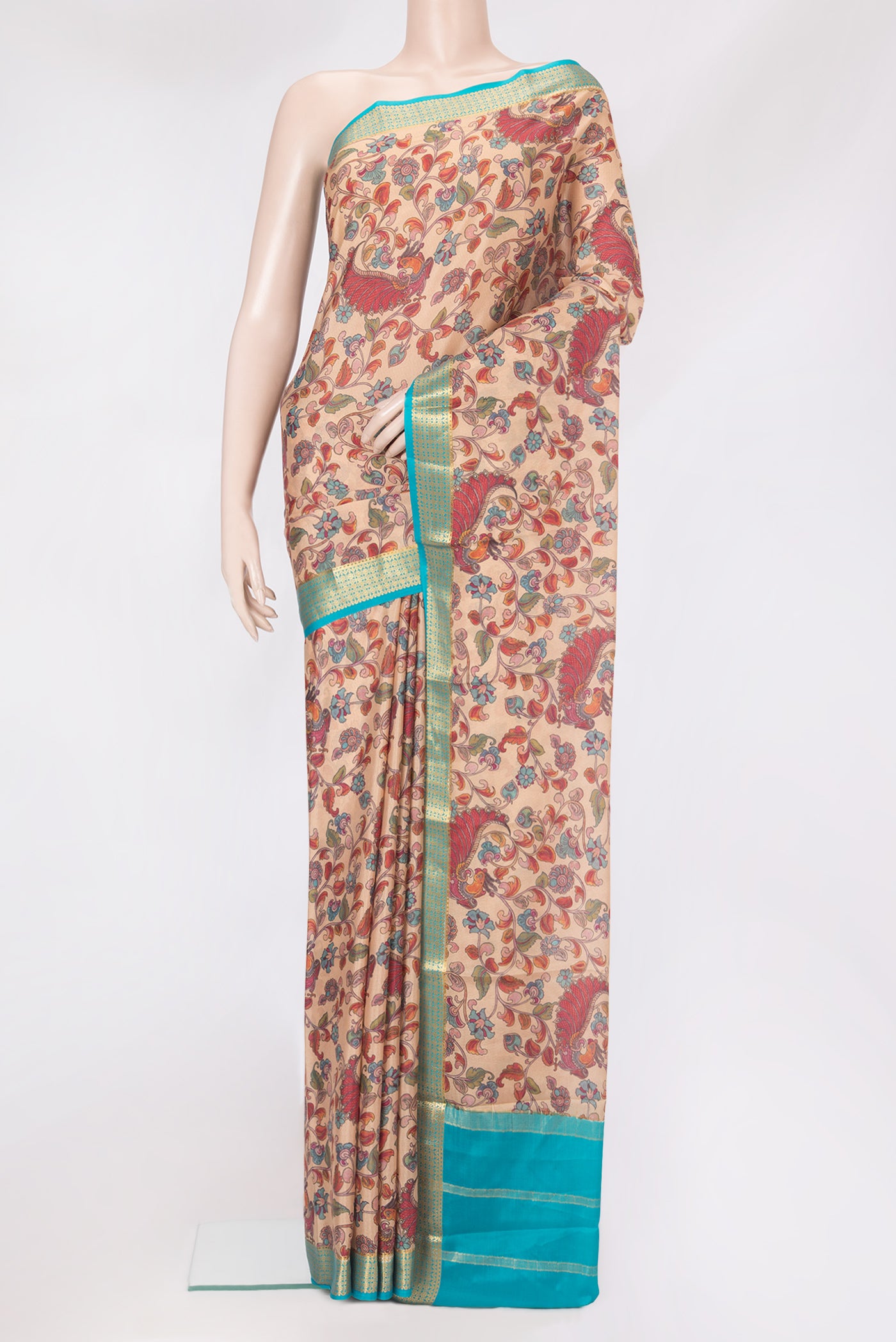 Sandal Mysore Silk Saree with Printed design on the body and Zari Border.  displayed on a mannequin
