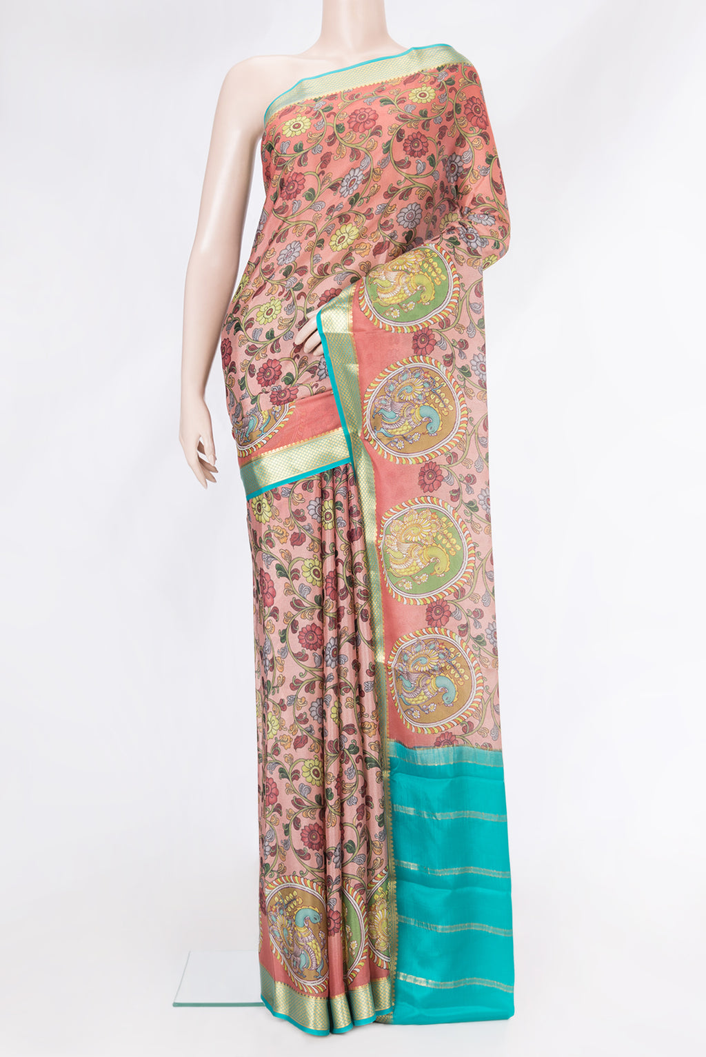 Peach Dual Tone Mysore Silk Saree with Printed design on the body and Zari Border.  displayed on a mannequin