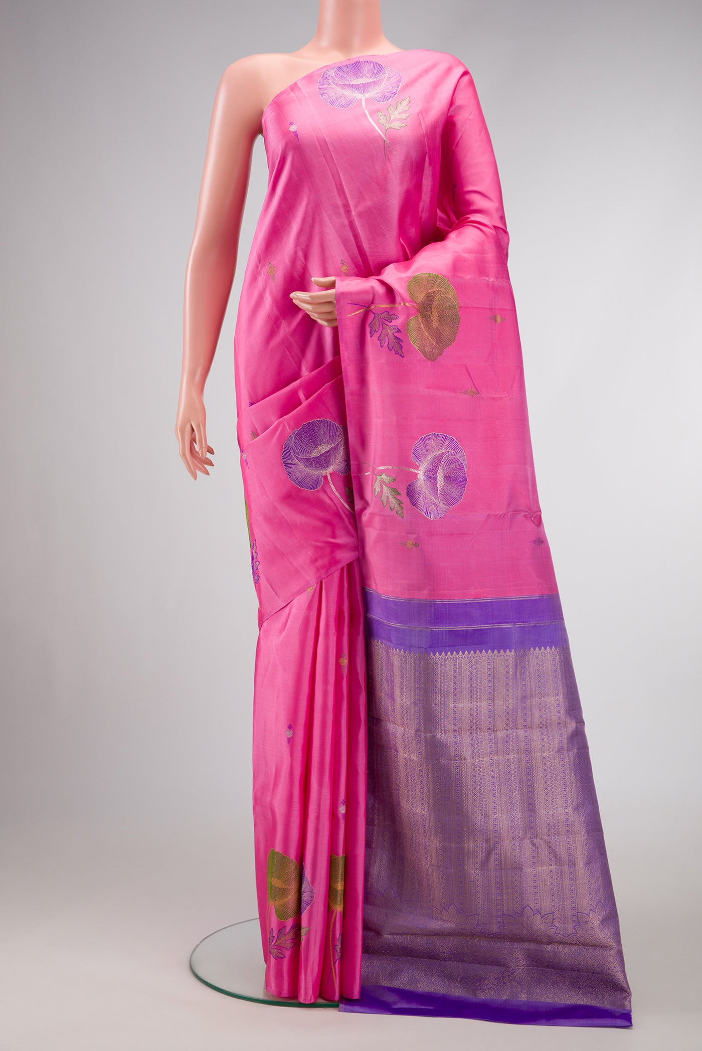 Pure Silk Pure Zari Pink Dual Tone Kanjivaram Saree with Zari Butta on the body and Fancy Border.  displayed on a mannequin