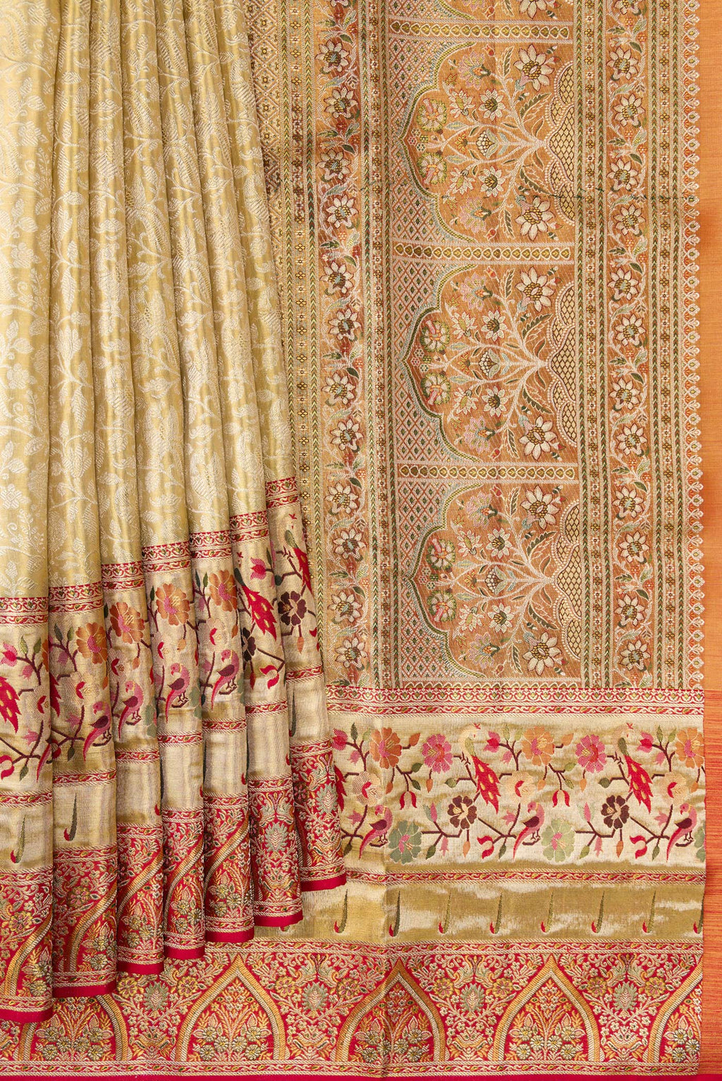 Pleats and pallu of Gold Dual Tone Kanchipuram Tissue Silk Saree with Zari Brocade on the body and Fancy Border. 
